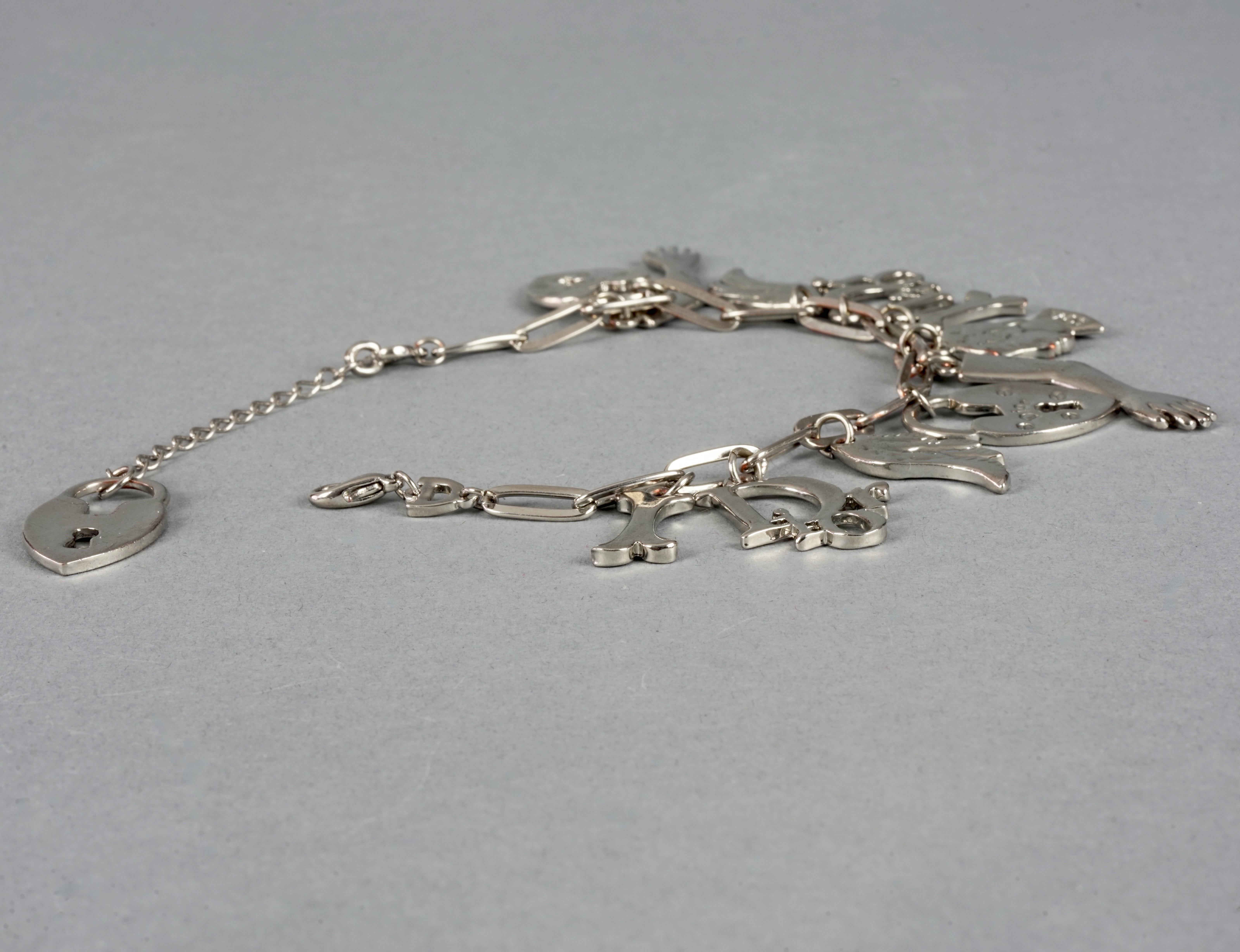 Vintage CHRISTIAN DIOR by GALLIANO Figural Charm Silver Bracelet In Good Condition For Sale In Kingersheim, Alsace
