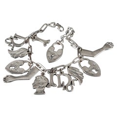 Vintage CHRISTIAN DIOR by GALLIANO Figural Charm Silver Bracelet