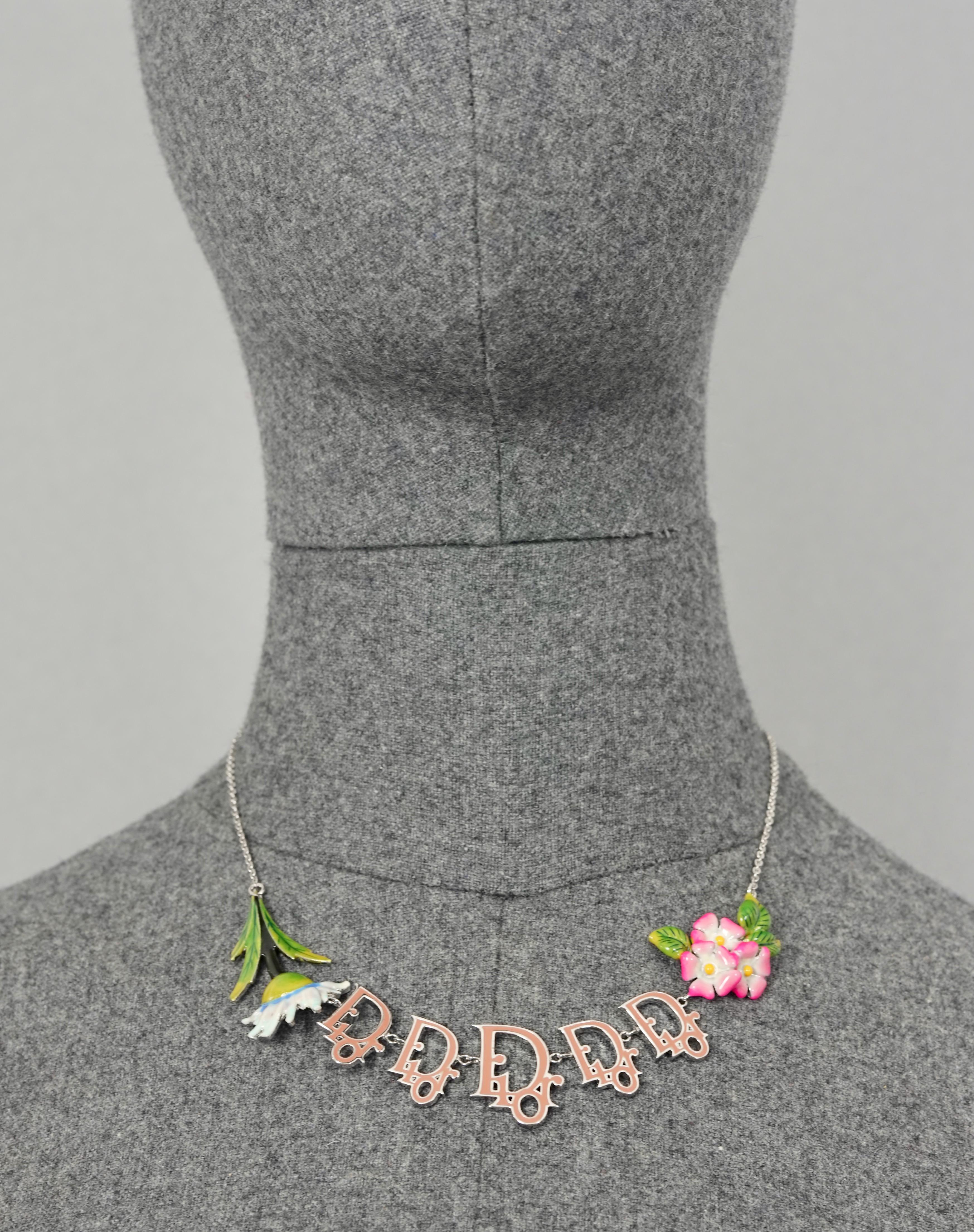 Vintage CHRISTIAN DIOR by GALLIANO Monogram Charm Flower Enamel Necklace

Measurements:
Height: 1 inch (2.5 cm)
Wearable Length: 14.37 inches to 16.73 inches (36.5 cm to 42.5 cm)

Features:
- 100% Authentic CHRISTIAN DIOR by GALLIANO.
- Enamel DIOR
