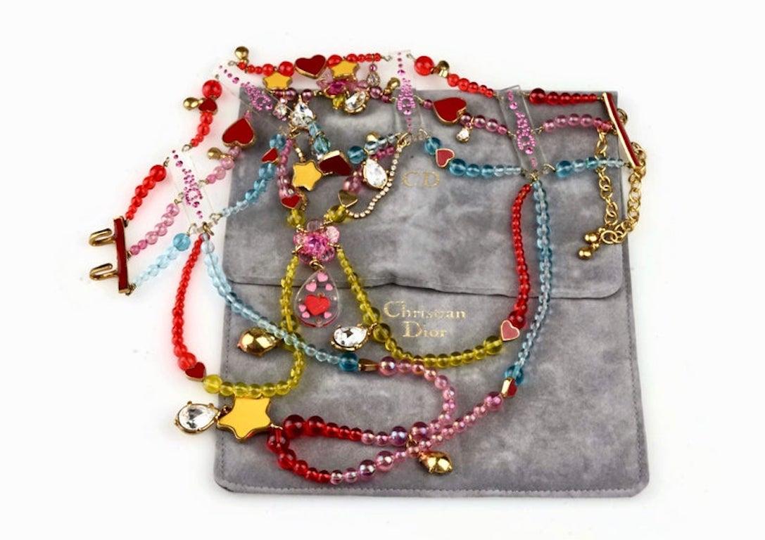 Measurements:
Height Drop at the Centre: 11.81 inches (30 cm)
Wearable Length: 11.81 inches to 14.17 inches (30 cm to 36 cm)

Features:
- 100% Authentic CHRISTIAN DIOR by John Galliano.
- Multiple rows of colourful beads and charms in Masai style.
-