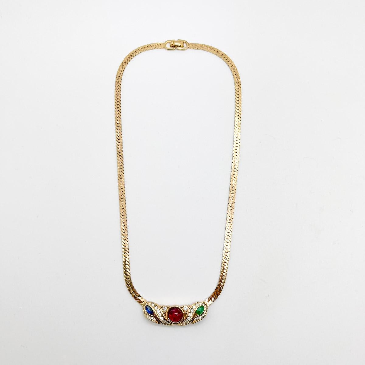 A glorious vintage Dior Jewelled Necklace and Earrings dating to the 1980s. The cabochon stones in round, oval and teardrop cuts crafted to mimic sapphire, ruby and emerald. A glamorous jewelled style statement from the House of Dior in the