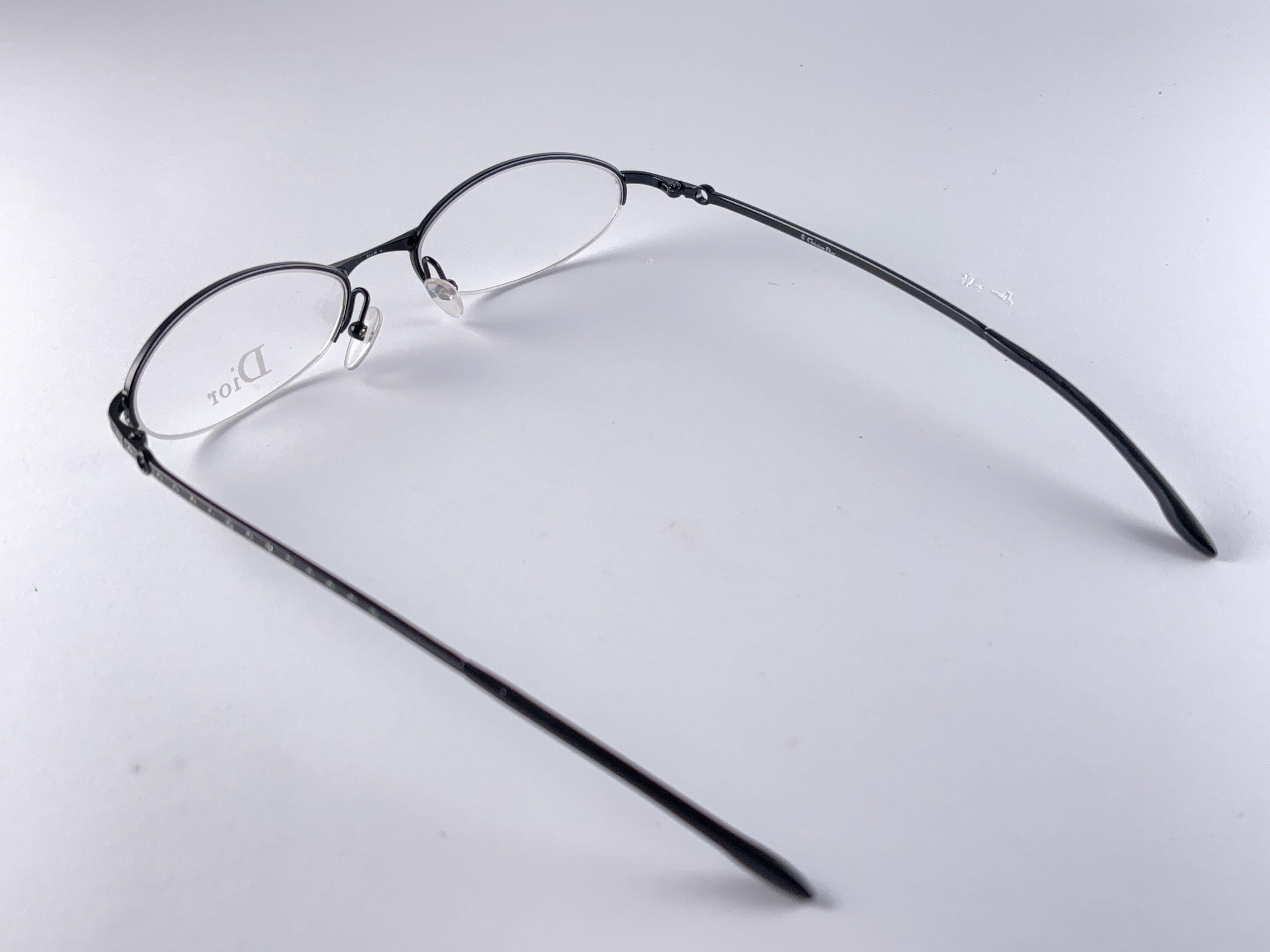 
Classy And Eye Catching Vintage Christian Dior CD 3628 oval half Frame Holding A Pair Of Translucent Lenses ready  for your prescription.

New! Never Worn Or Displayed

This Item May Minor Sign Of Wear Due To Storage



Made In Italy



Front      