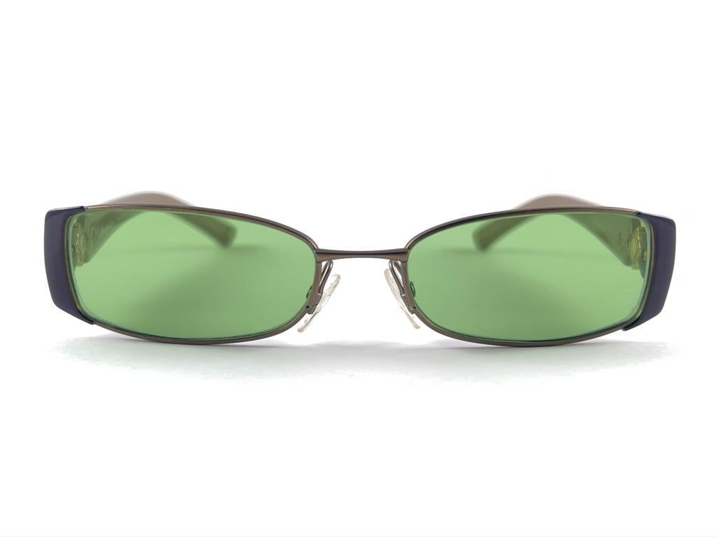 
Classy And Eye Catching Vintage Christian Dior CD 3747 Rectangular Frame Holding A Pair Of Green Lenses Sunglasses.

New! Never Worn Or Displayed

This Item May Show Minor Sign Of Wear Due To Storage



Made In Italy



Front                       