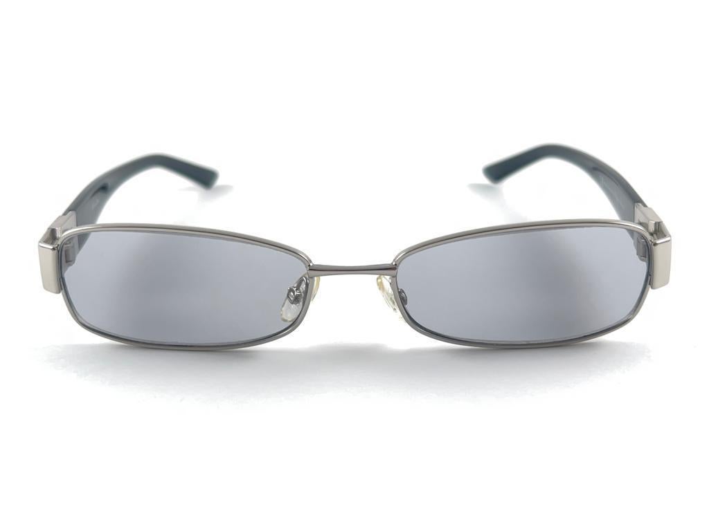 

Classy And Eye Catching Vintage Christian Dior CD3715 Silver & Black Frame Holding A Pair Of Light Grey Lenses Sunglasses.

New! Never Worn Or Displayed


This Item May Show Minor Sign Of Wear Due To Storage.



Made In Italy





Front           