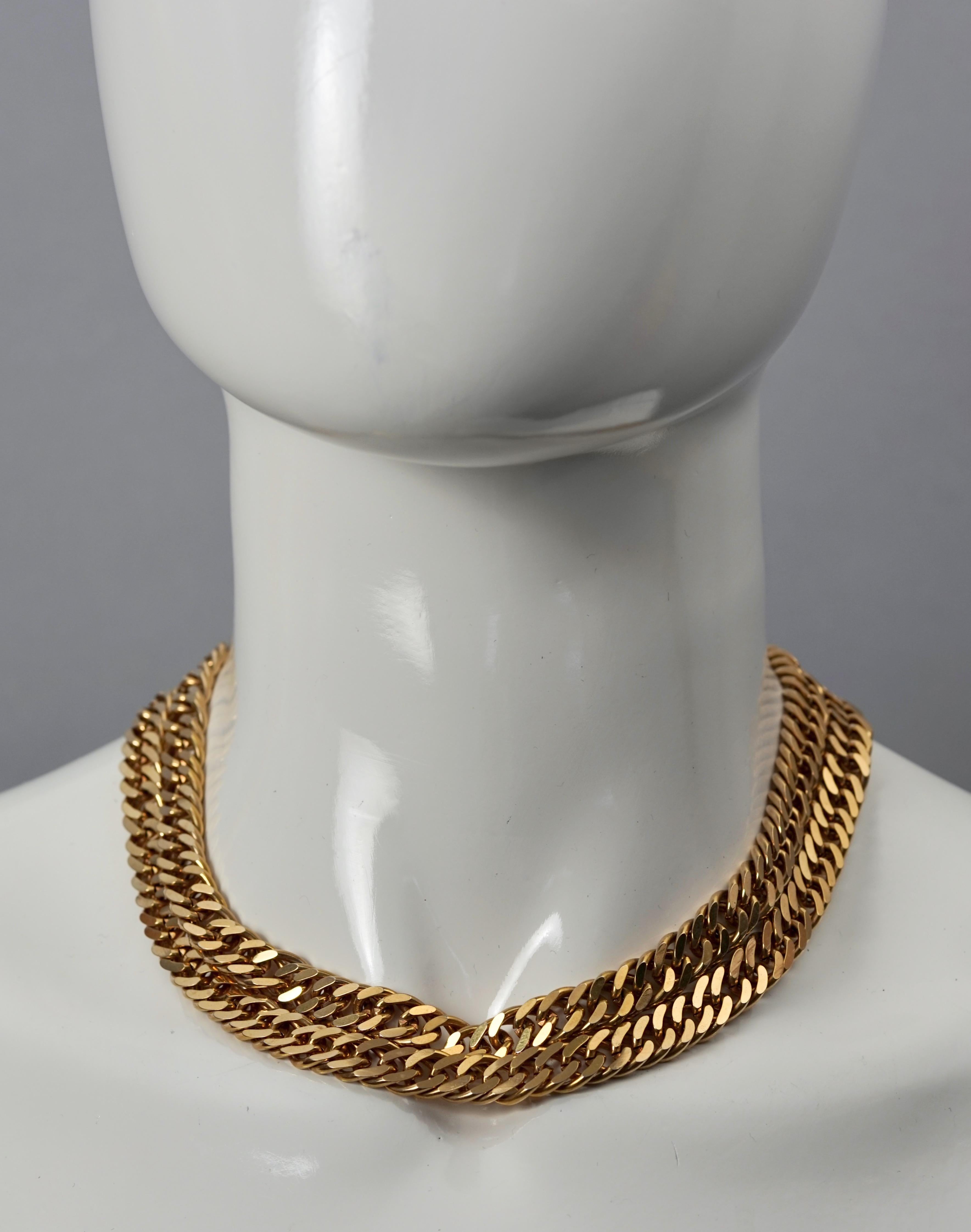 Vintage CHRISTIAN DIOR Chunky Double Chain Choker Necklace

Measurements:
Height: 0.78 inch (2 cm)
Adjustable Length: 15.74 inches to 17.51 inches (40 cm to 44.5 cm)

Features:
- 100% Authentic CHRISTIAN DIOR.
- Double layer of chunky chains