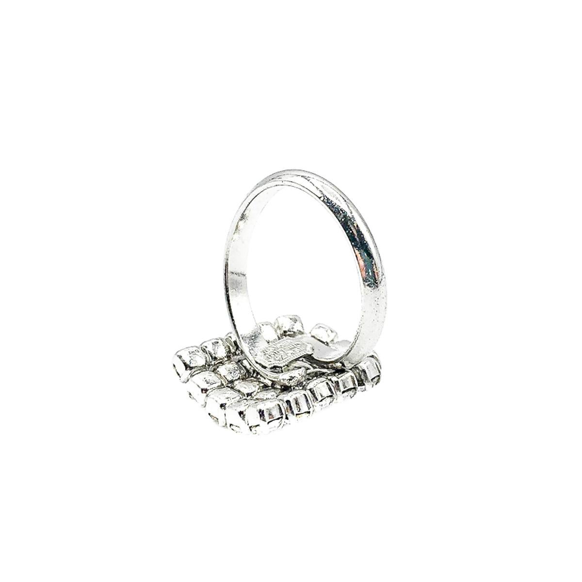 A beautiful Vintage Dior Crystal Cocktail Ring. Crafted in rhodium plated metal and set with Swarovski chaton stones, individually claw set. In very good vintage condition, UK ring size approx. N with adjustable band, signed. A stunningly glamorous