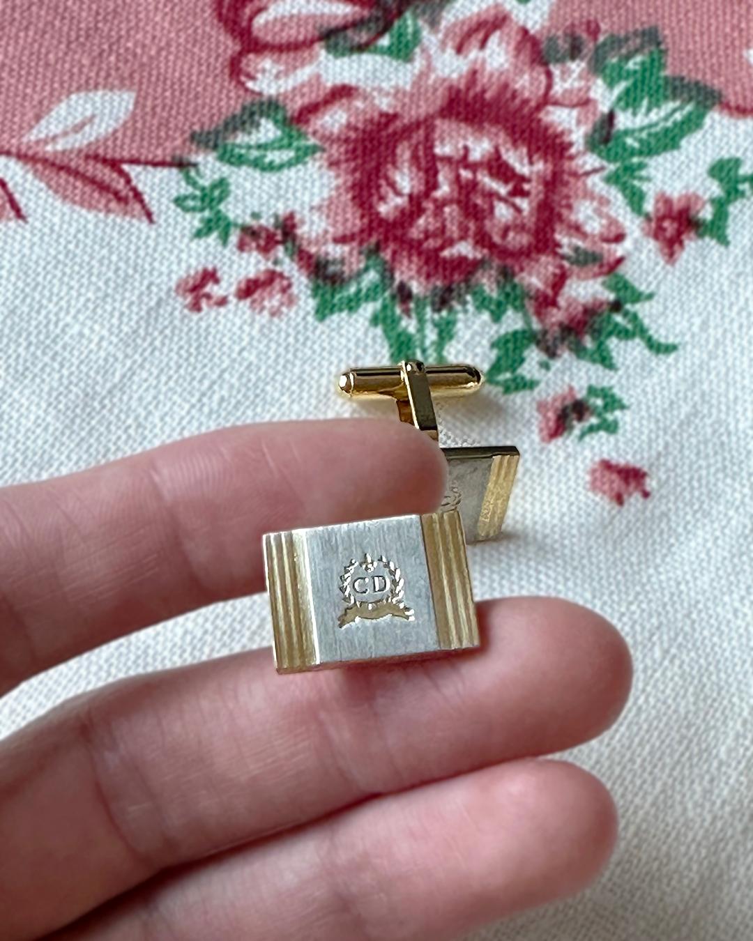 VERY BREEZY presents: These vintage Christian Dior cufflinks are such a one-of-a-kind gift— or gift for yourself! I love the crest design, with the CD logo in the center. It gives a royal vibe! They are both silver and gold, making them especially
