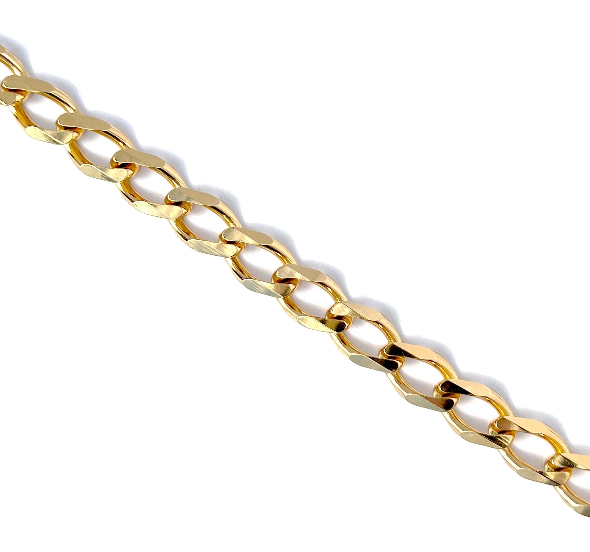 Vintage 1990s Christian Dior curb chain necklace in gold plate.  This choker length heritage necklace features chunky flat curb chain links in a high-polish finish.  The necklace fastens with a foldover clasp and measures 16 inches in length.  Very