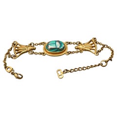 CHRISTIAN DIOR Bracelet à chaîne vintage en forme de scarabée de style néo-égyptien