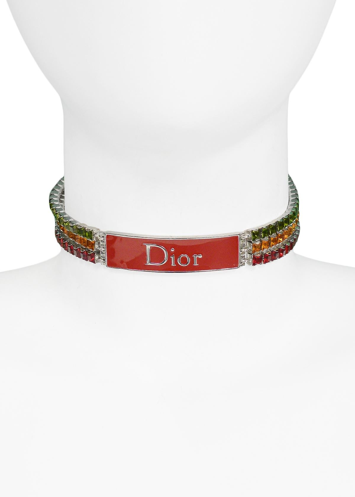Vintage Christian Dior red, orange, and green rhinestone Rasta-style choker with red enamel Dior logo plate and hook closure.

Excellent Vintage Condition.
