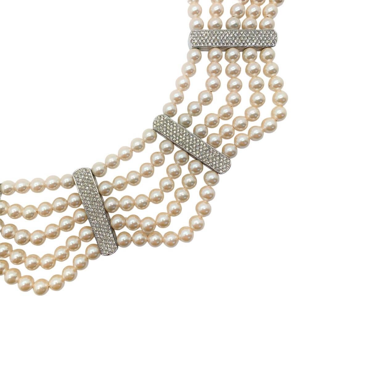 A truly special vintage Dior pearl collar from the 1980s with pearls of the most incredible colour. Featuring a fabulous five rows of lustrous glass simulated pearls punctuated with contrasting crystal stations. All in all, giving the timeless feel