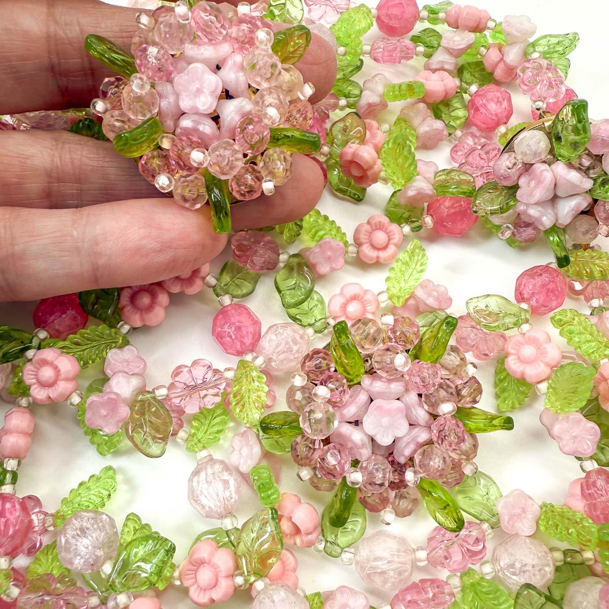 A fabulous Vintage Christian Dior Floral Necklace and Earring Set crafted by the House in 1967 whilst Marc Bohan was head of design. Six wonderful strands of flower power are finished with a statement clasp and statement pair of earrings to complete