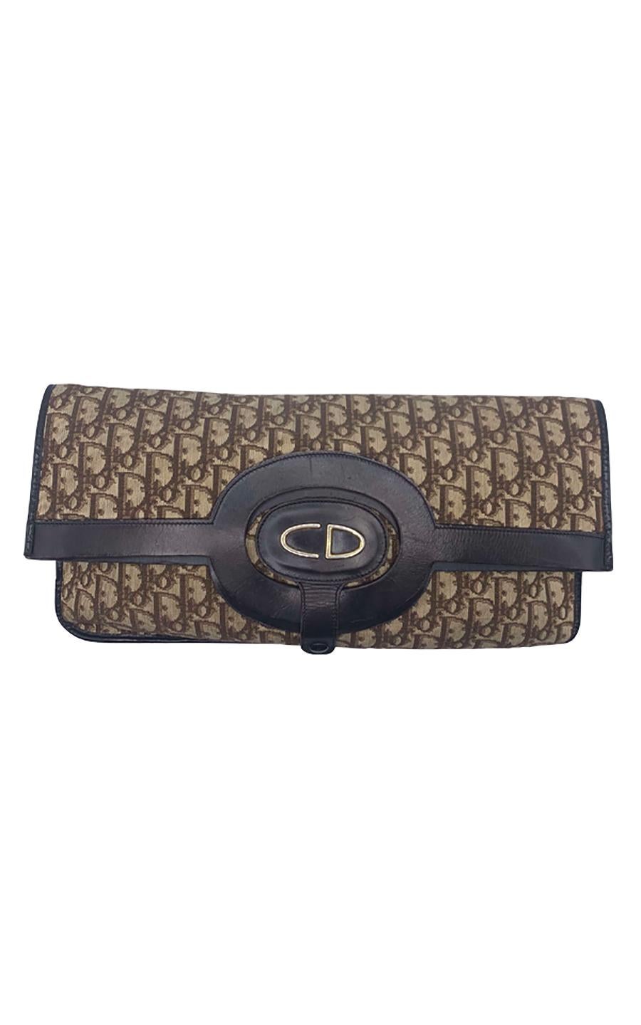 Vintage Christian Dior monogram canvas and leather fold-over envelope clutch, in excellent pre-loved condition. This iconic bag is notably known as the bag Carrie Bradshaw (Sarah Jessica Parker) wore in Sex and the City ‘To Market, To Market’