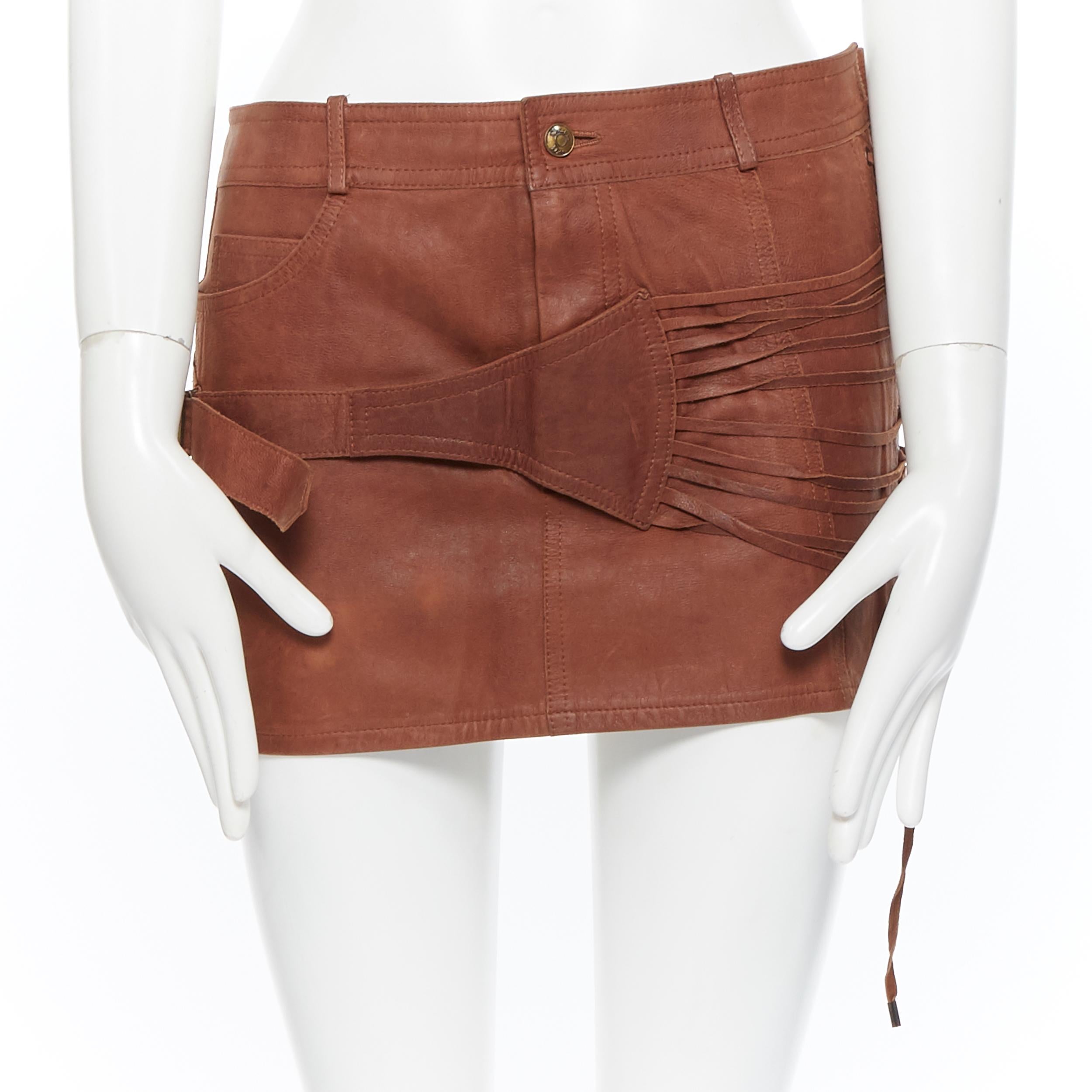 vintage CHRISTIAN DIOR Galliano brown leather strappy buckle mini skirt FR38
Brand: Christian Dior
Designer: John Galliano
Model Name / Style: Leather skirt
Material: Leather
Color: Brown
Pattern: Solid
Closure: Button
Extra Detail: Low rise.
Made