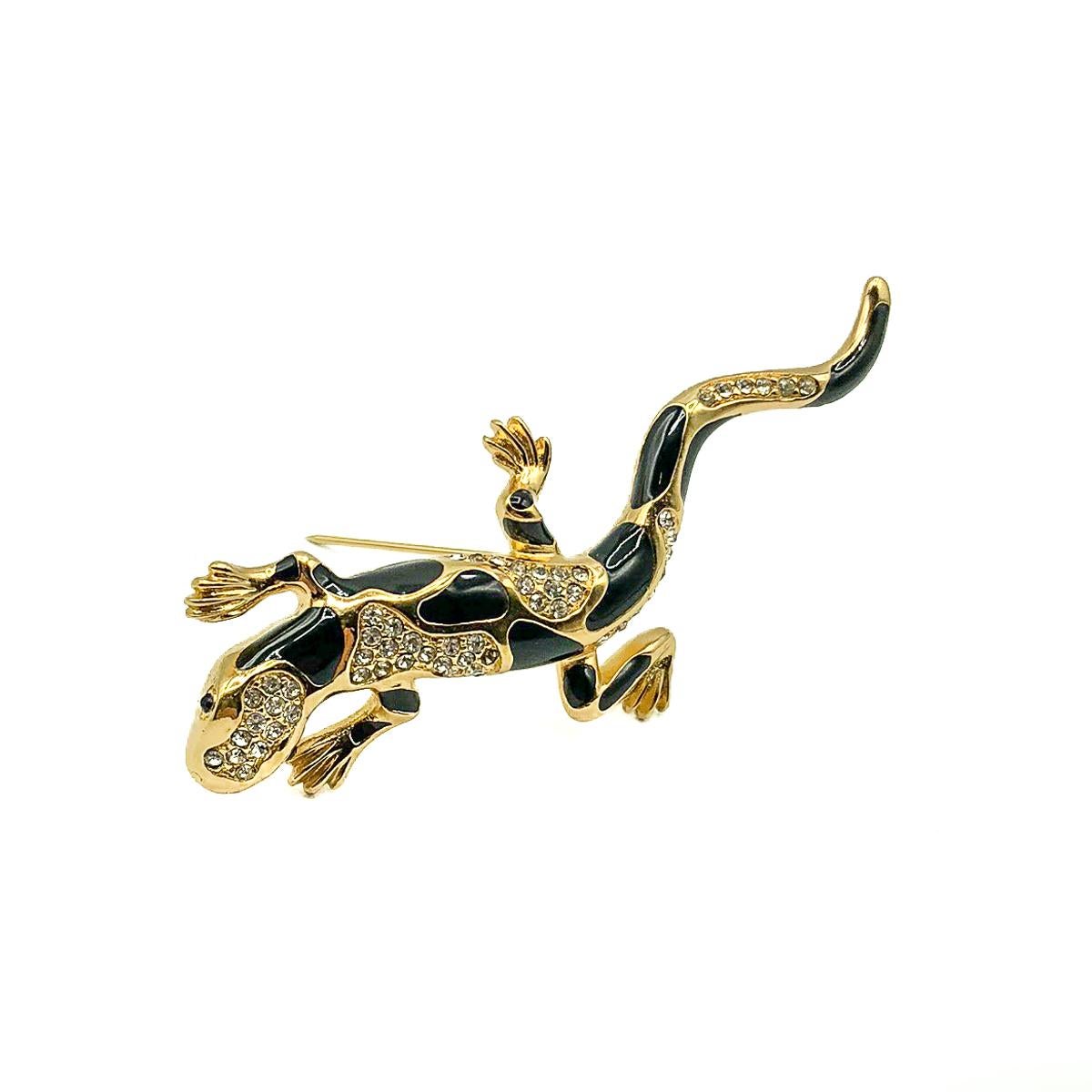 A delightful Vintage Dior Lizard Brooch. Crafted in gold plated metal and set with crystals and enamelling. The lizard is believed to be associated with protection, good fortune and prosperity. In very good vintage condition. Signed. 7.5cms. A
