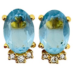 Boucles d'oreilles vintage CHRISTIAN DIOR en verre bleu doré avec clip.