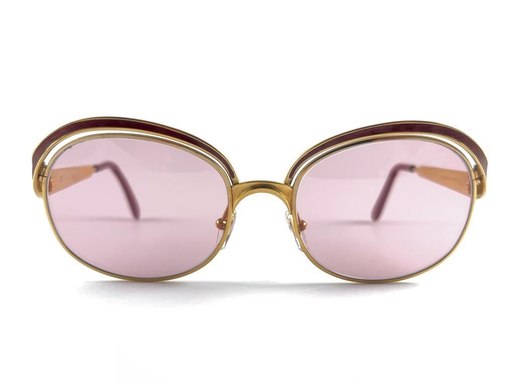 Or Lunettes de soleil vintage Christian Dior or et bourgogne Made in Austria en vente