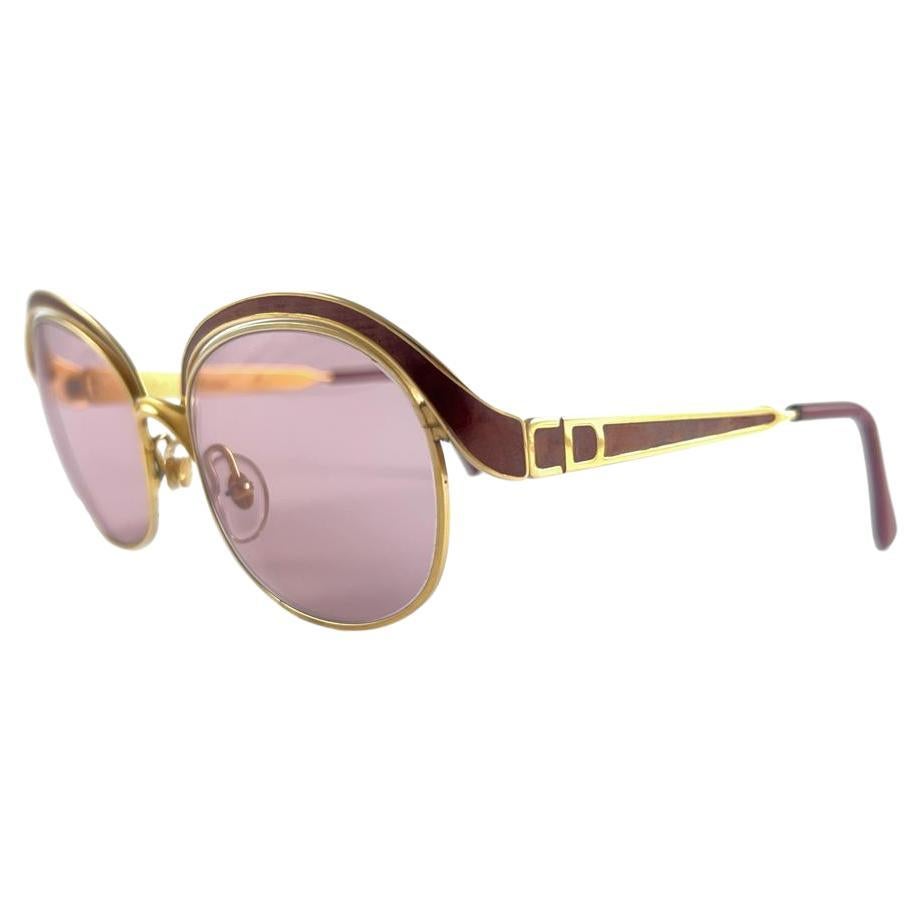 Vintage Christian Dior Gold- und Burgunderfarbene Vintage-Sonnenbrille, hergestellt in Österreich