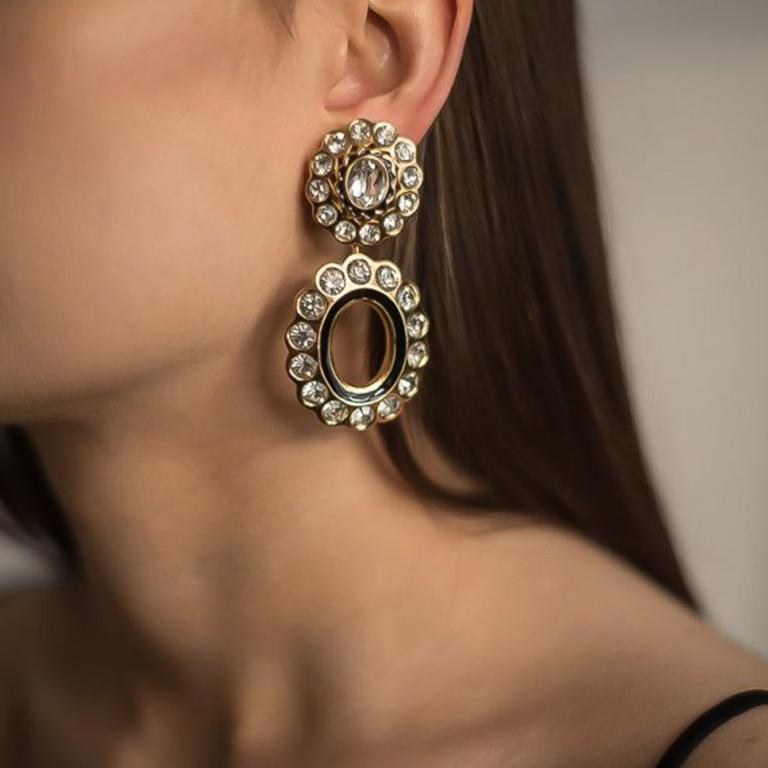 Spectacular! These uber glamorous statement 1980s Vintage Dior Double Hoop Earrings are the bomb. Featuring high quality gold plate lavishly adorned with Swarovski crystals and edged with a fine black enamel detailing. Measuring approx. 6.75cm and