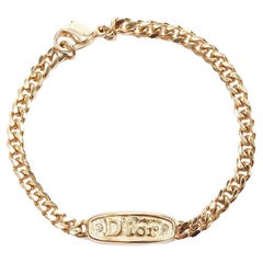 vintage CHRISTIAN DIOR gold kristall logo ID tag armband