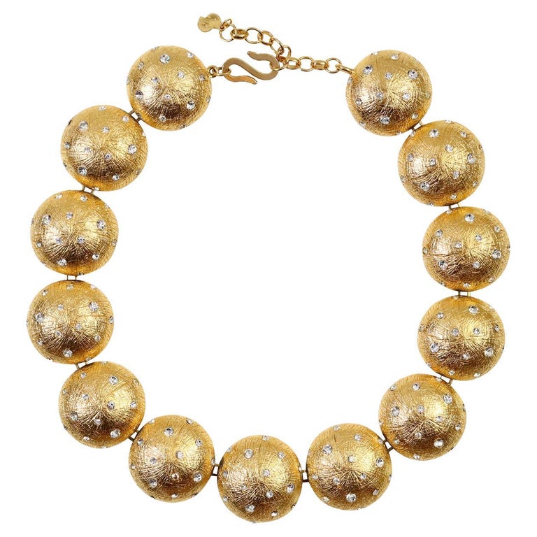 Vintage Christian Dior Gold Disc Necklace with Crystals Circa 1980s. Classic Dior necklace with round disc with texture with inlaid crystals.  Always looks good and elevates your outfit or even with an open dress and just skin. 16.5