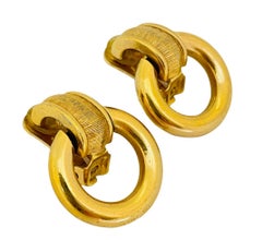 Vintage CHRISTIAN DIOR gold door knocker dangle designer runway clip on earrings