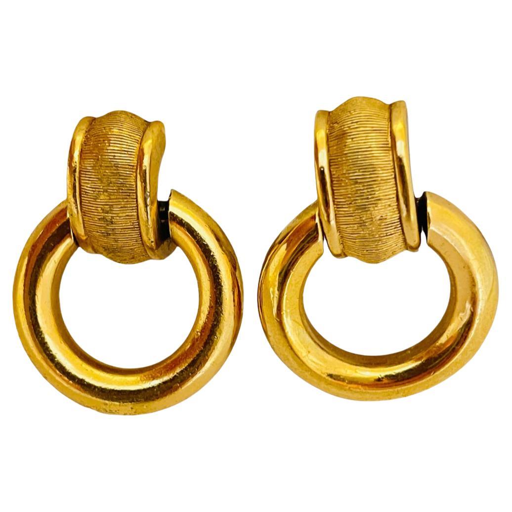 Vintage CHRISTIAN DIOR gold door knocker dangle designer runway clip on earrings For Sale
