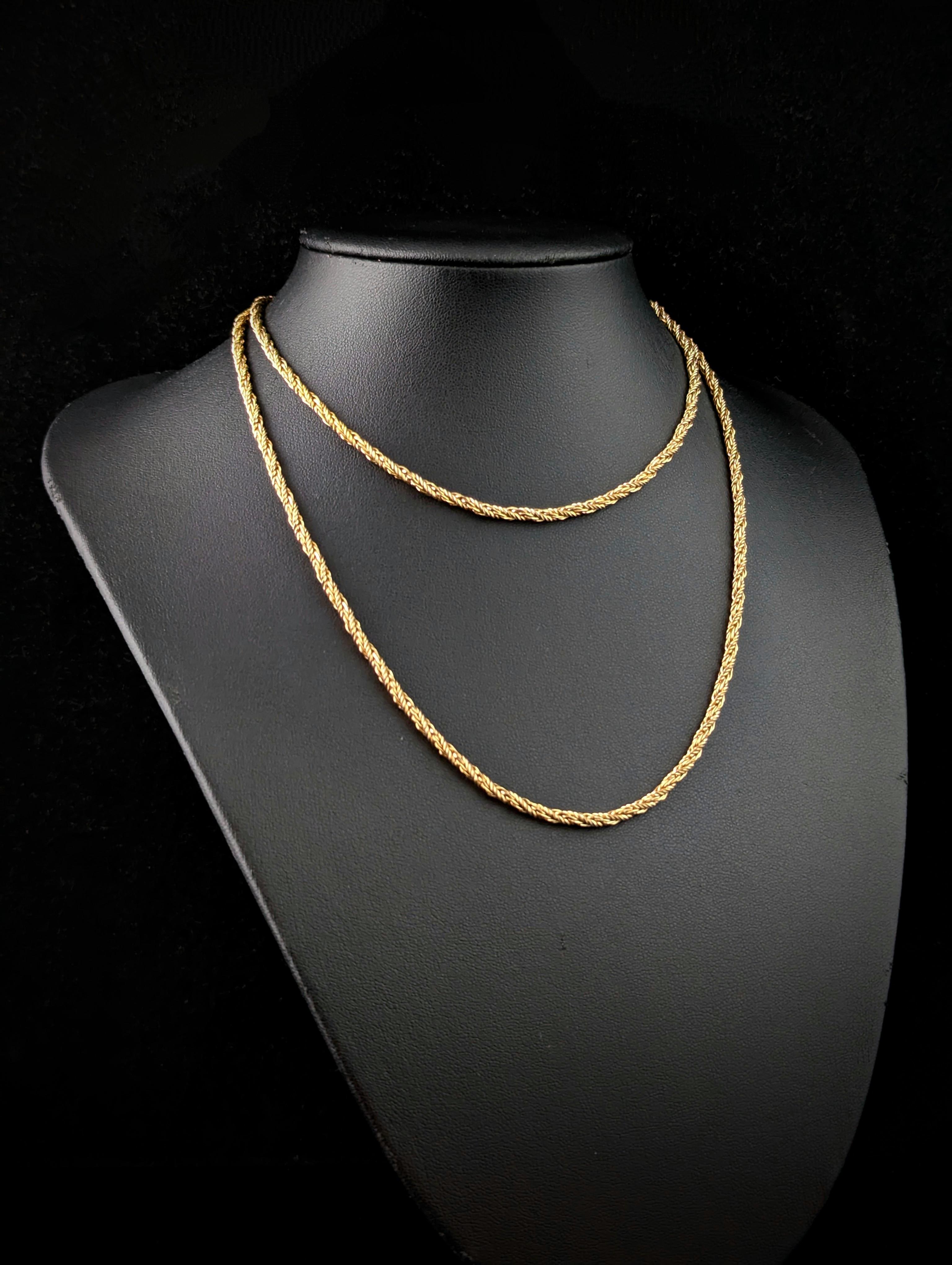 A gorgeous vintage Christian Dior chain necklace.

Gold plated metal, the chain is a nice long length that can easily be wrapped over twice and is designed with a lovely fancy rope twist style link.

It has a CD design clasp and is marked on the