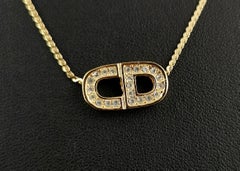 Vintage Christian Dior gold tone diamante logo pendant necklace