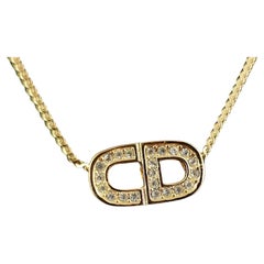  Vintage Christian Dior gold tone diamante logo pendant necklace 