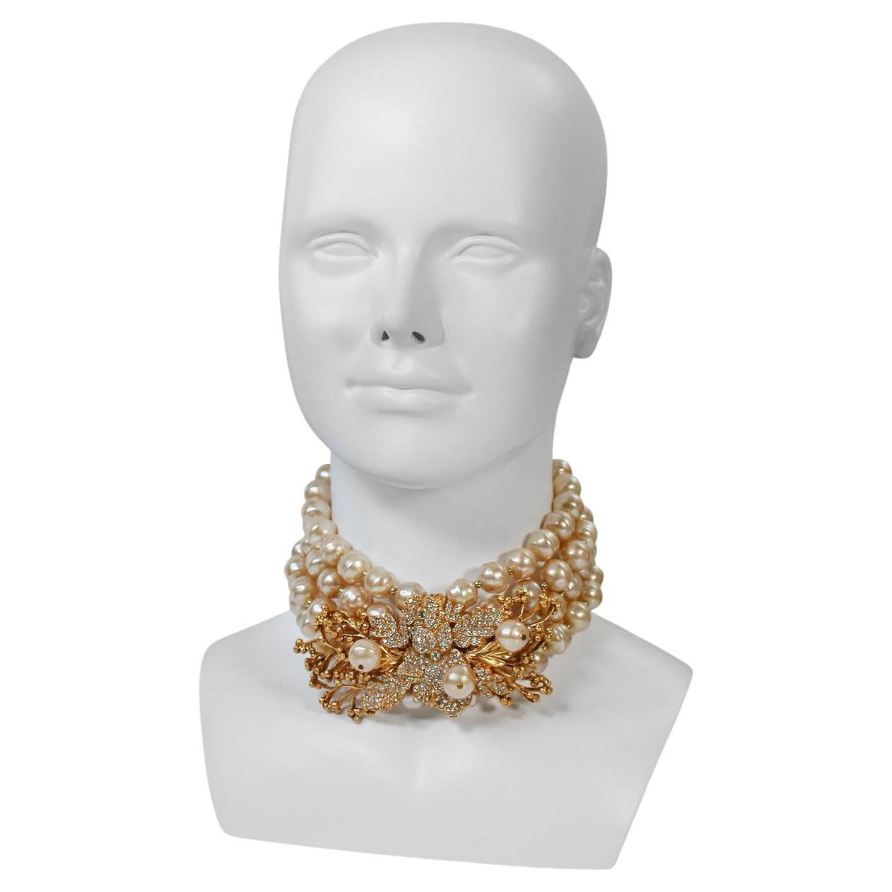 Vintage Christian Dior Couture Gold Tone with Rhinestone and Pearl Choker with Large Medallion Like Piece on Front in Middle on Top of four rows of Pearls. There are two rows of Chain to Close at Back but it is possible that two rows of additional