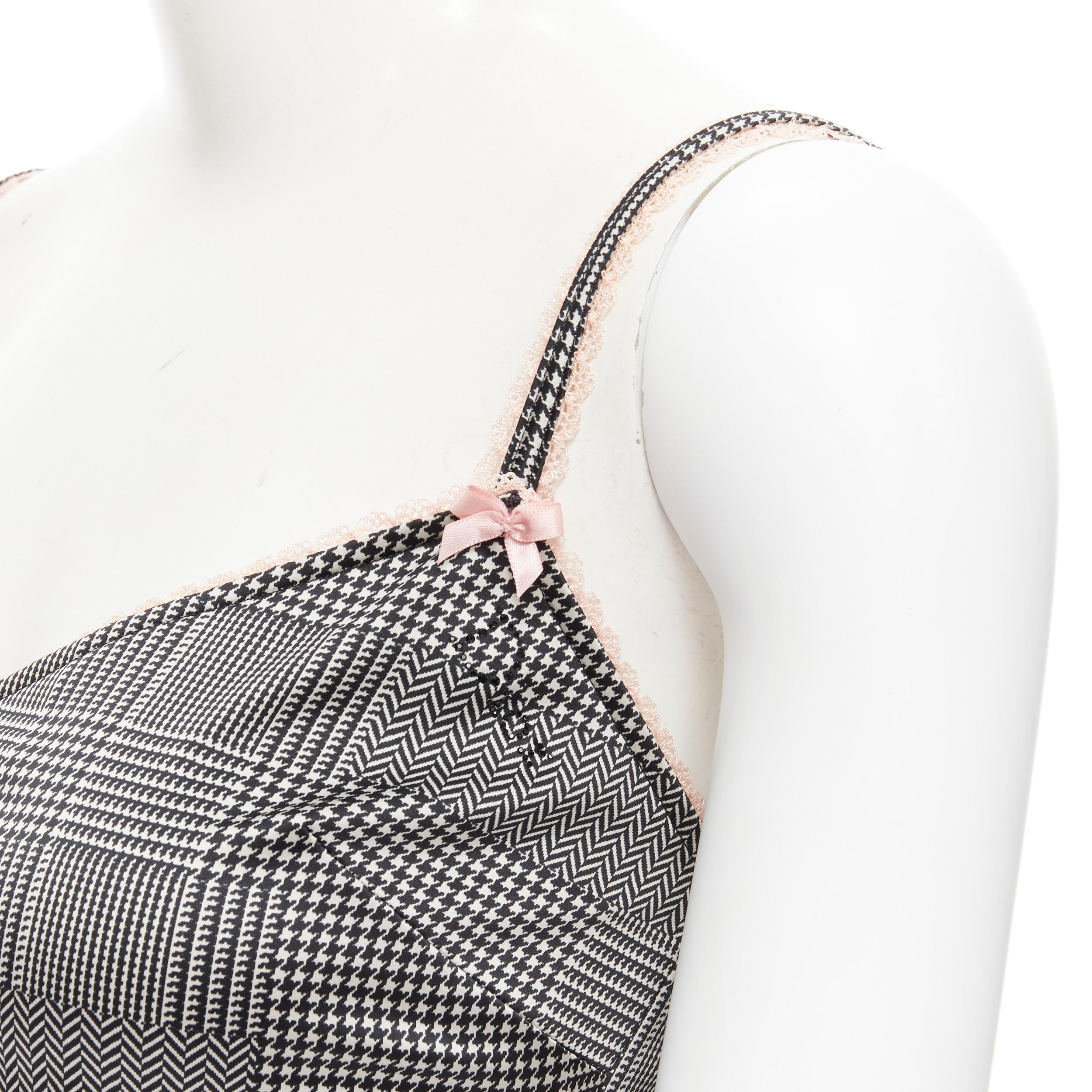 vintage CHRISTIAN DIOR grey check houndstooth pink lace mini dress FR36 S 
Reference: TGAS/B01712 
Brand: Christian Dior 
Designer: John Galliano 
Material: Polyester 
Color: Grey 
Pattern: Herringbone 
Extra Detail: Stretch fit. Lace ribbon
