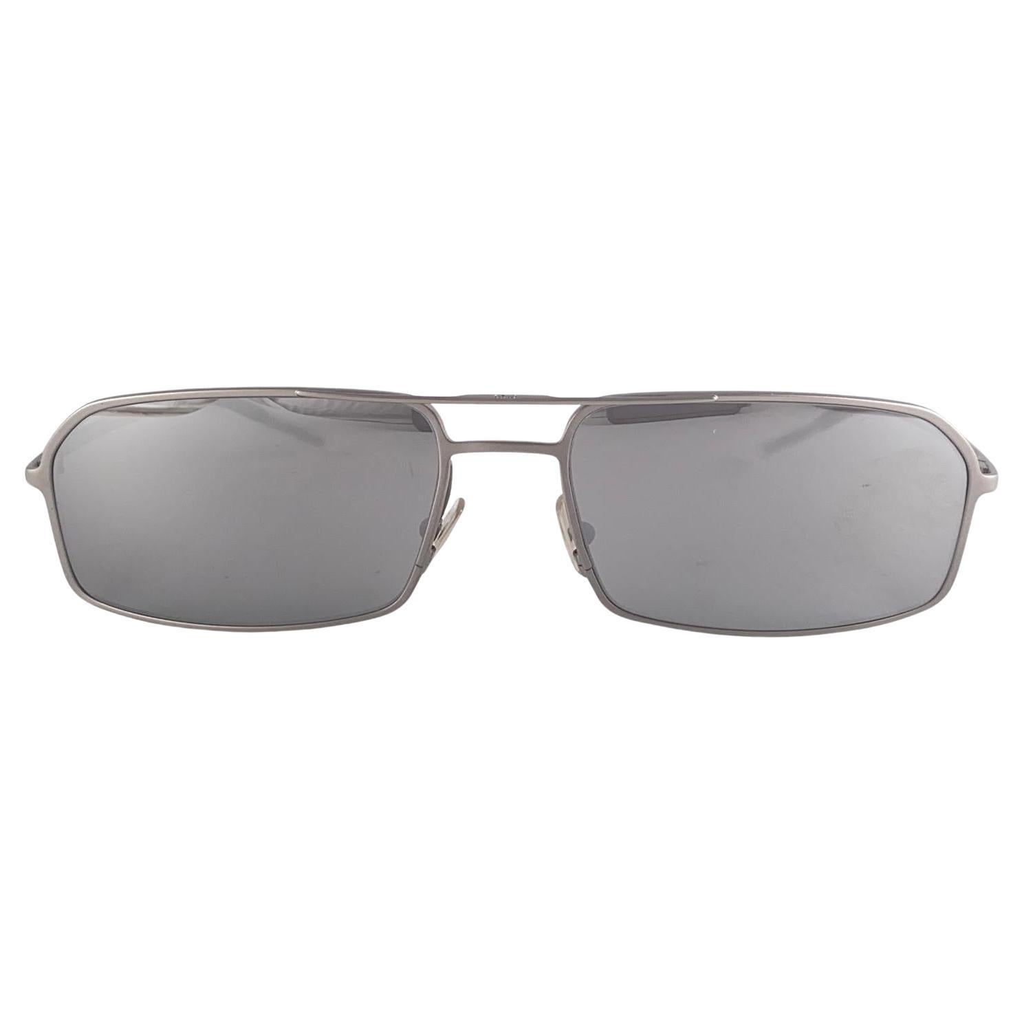 

Nuevo Vintage Christian Dior Homme Gafas de sol Marco de plata Con lentes de espejo de plata 
Fuerte e impresionante  Marco. ¡Una pieza imprescindible! 
Este artículo puede mostrar pequeños signos de desgaste debido al almacenamiento.