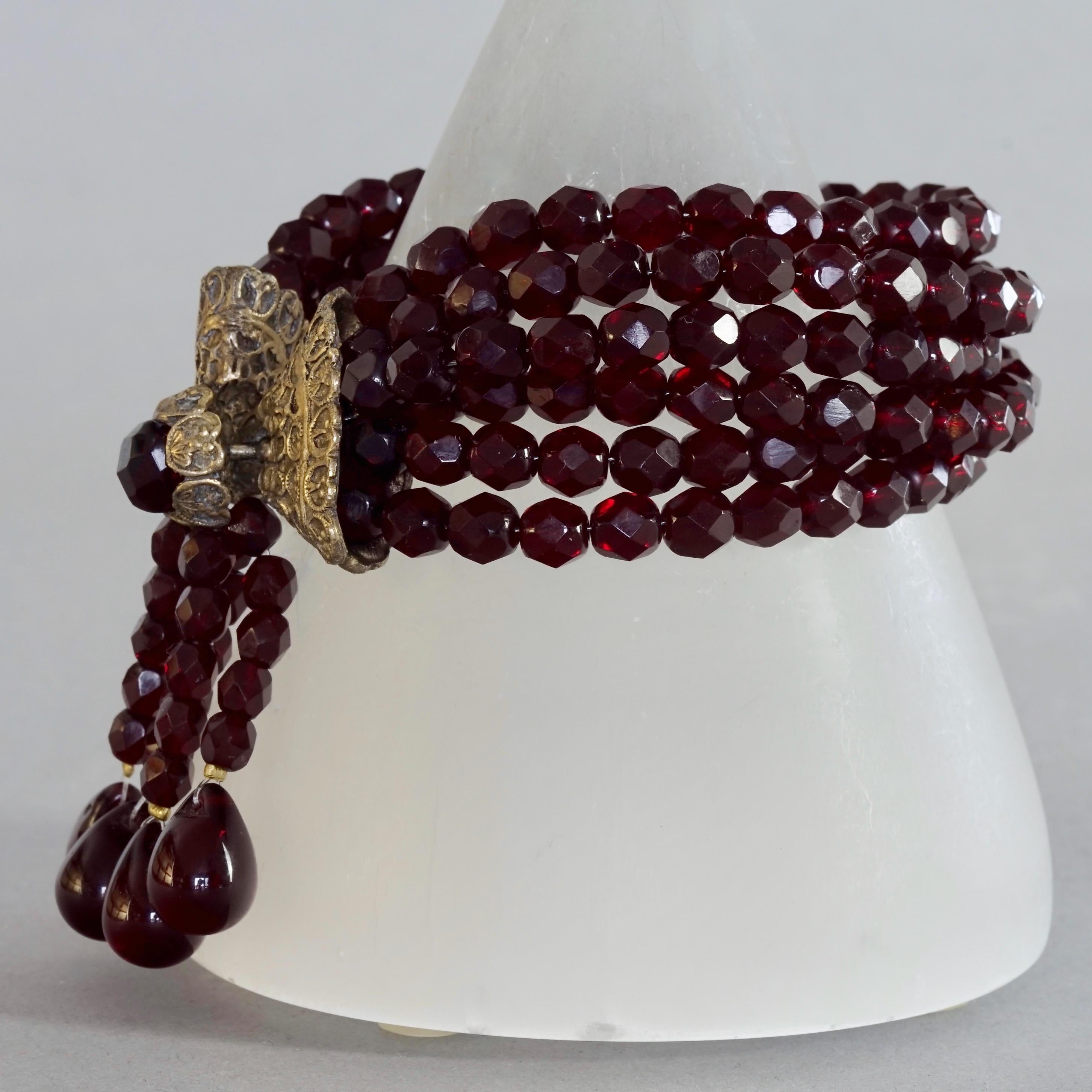 Vintage CHRISTIAN DIOR Hypnotic Poison Multi Strand Garnet Beaded Bracelet In Excellent Condition For Sale In Kingersheim, Alsace