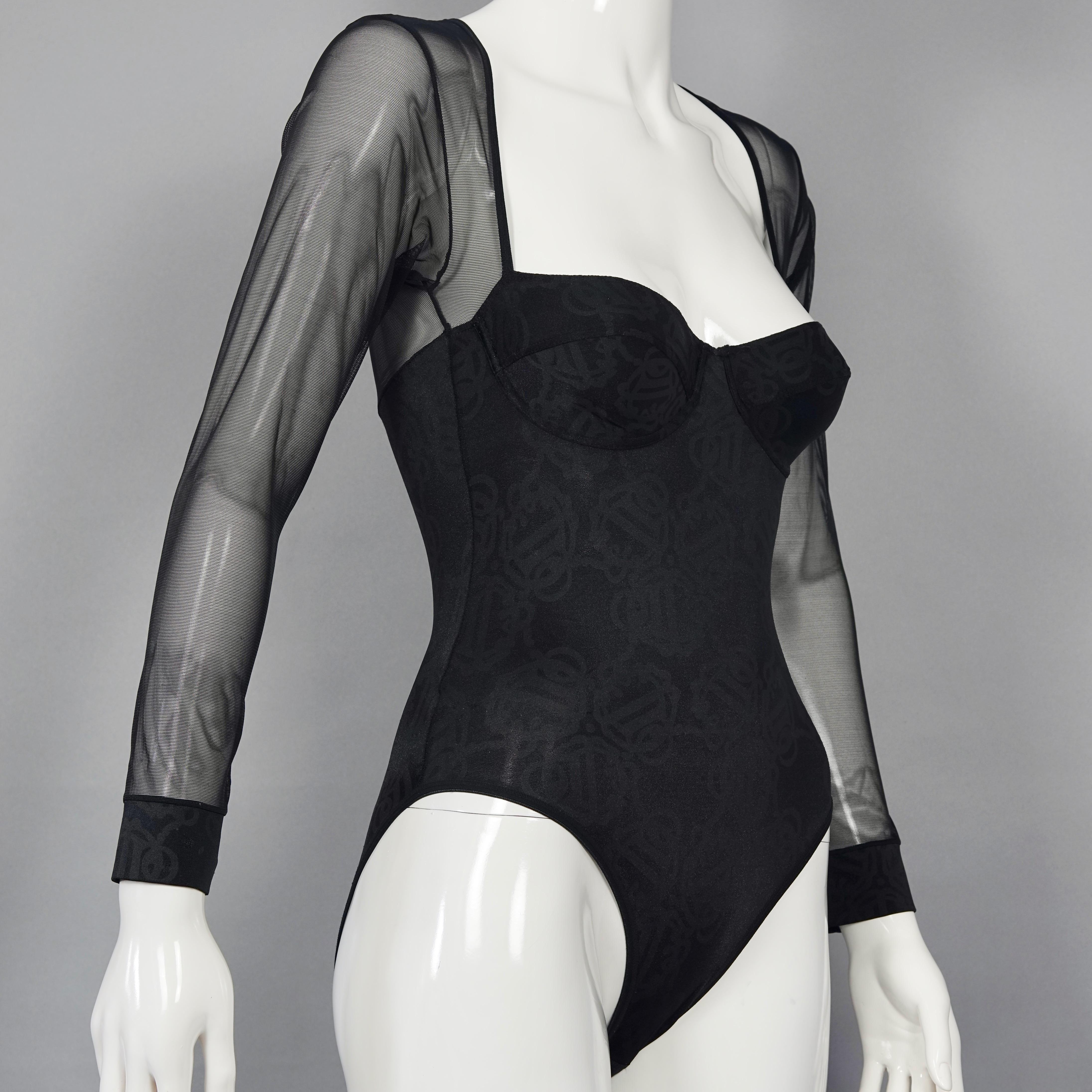 Vintage CHRISTIAN DIOR Insignia Logo Monogram Black Bodysuit

Measurements taken laid flat, please double bust, waist and hips:
Shoulder: 13.38 inches (34 cm) without stretching
Sleeves: 20.47 inches (52 cm) without stretching
Bust: 12.60 inches (32