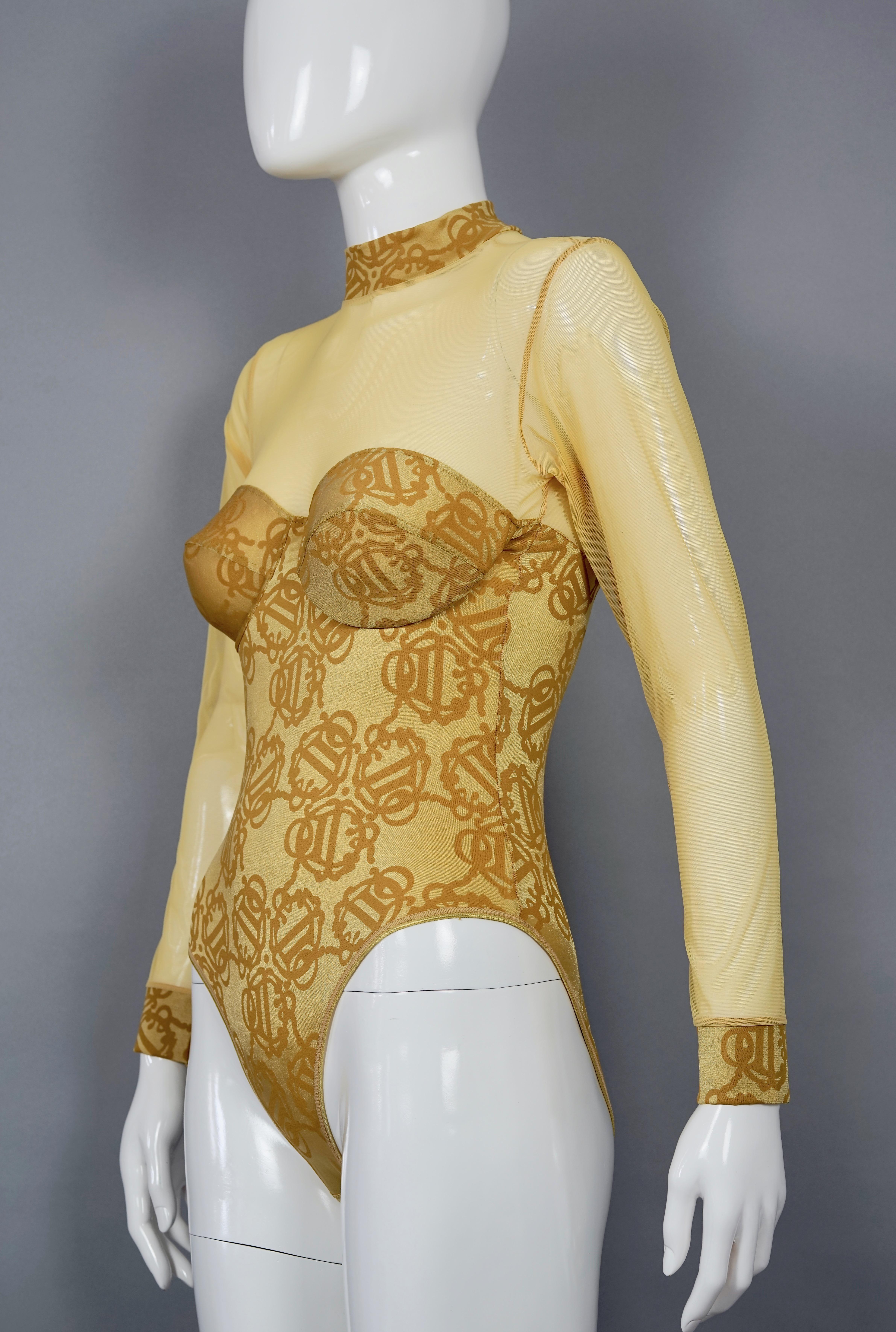 Vintage CHRISTIAN DIOR Insignia Monogram Yellow Bodysuit

Measurements taken laid flat, please double bust, waist and hips:
Shoulder: 13.77 inches (35 cm) without stretching it
Sleeves: 21.65 inches (55 cm) without stretching it
Bust: 13.38 inches