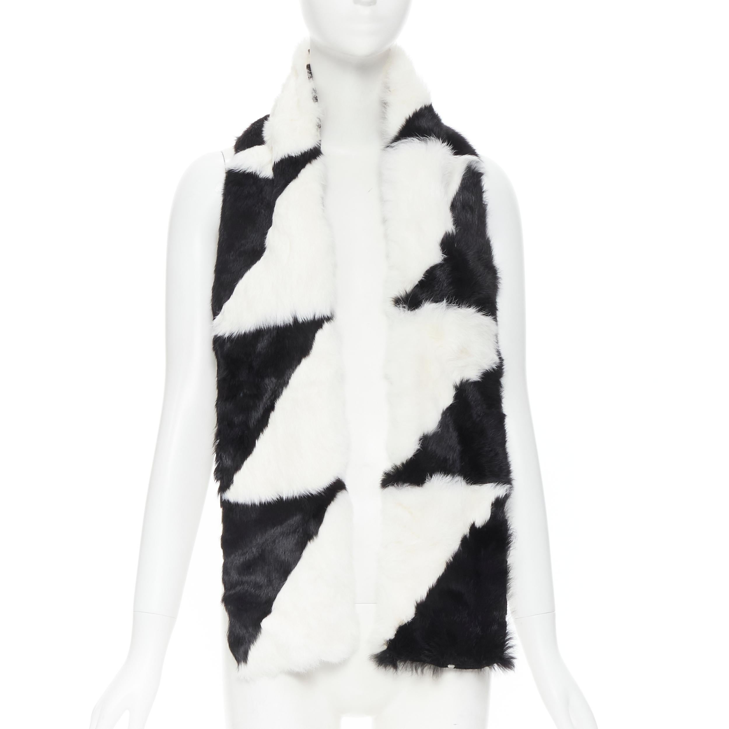 vintage CHRISTIAN DIOR John Galliano 2003 black white rabbit fur oriental scarf 
Reference: TGAS/B01660 
Brand: Christian Dior 
Designer: John Galliano 
Material: Fur 
Color: Black 
Pattern: Geometric 
Extra Detail: Geometric black and white rabbit