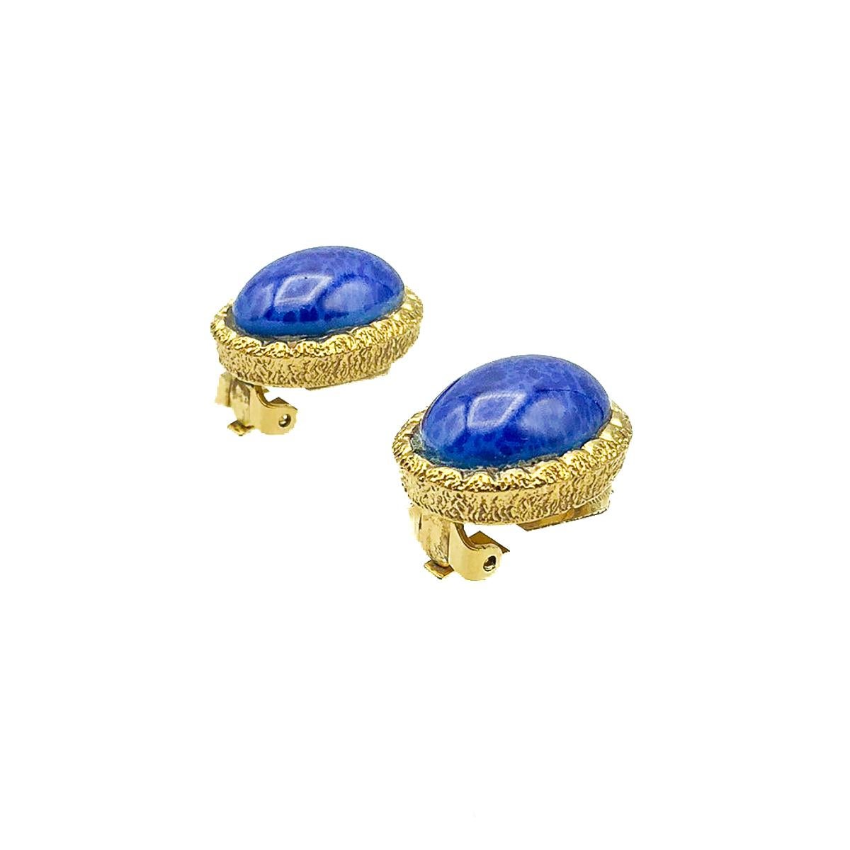 Vintage Dior Lapis Earrings. Crafted in gold plated metal with a large blue cabochon stone emulating lapis lazuli. Very good vintage condition, signed, 1.8cms. A perfectly timeless pair of earrings from the House of Dior. 

Established in 2016, this