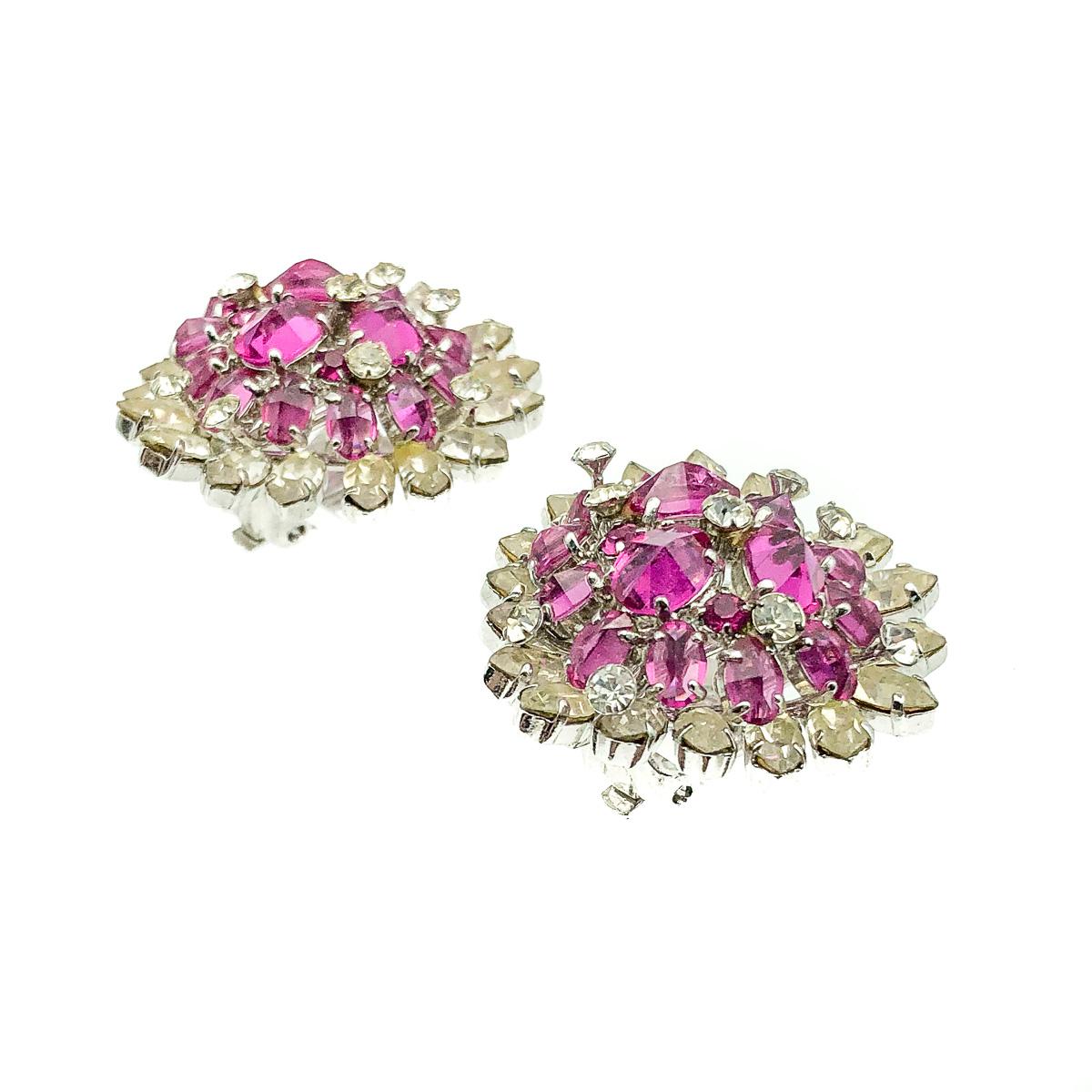 A beautiful and large pair of 1960s Vintage Dior Heart Earrings. 
Exquisitely crafted in rhodium plated metal. Featuring the most divine shade of raspberry pink crystals in fancy cuts and with reverse setting in play too. Surrounded and interspersed