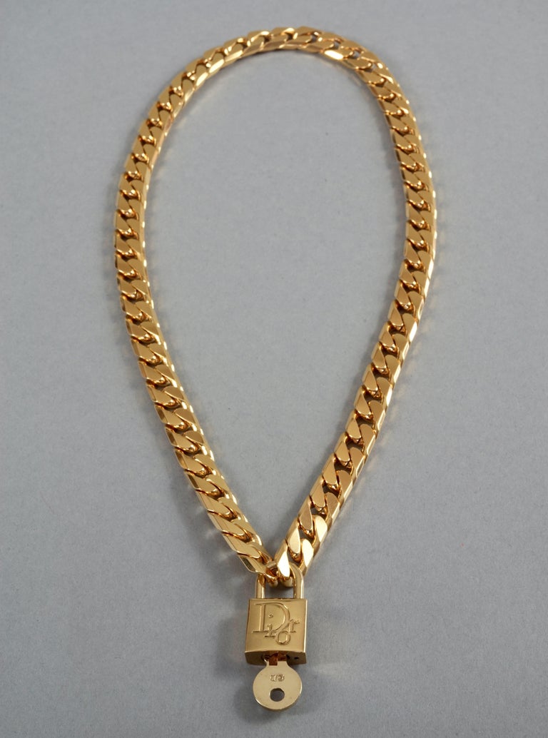 Dior gold lock hot sale necklace