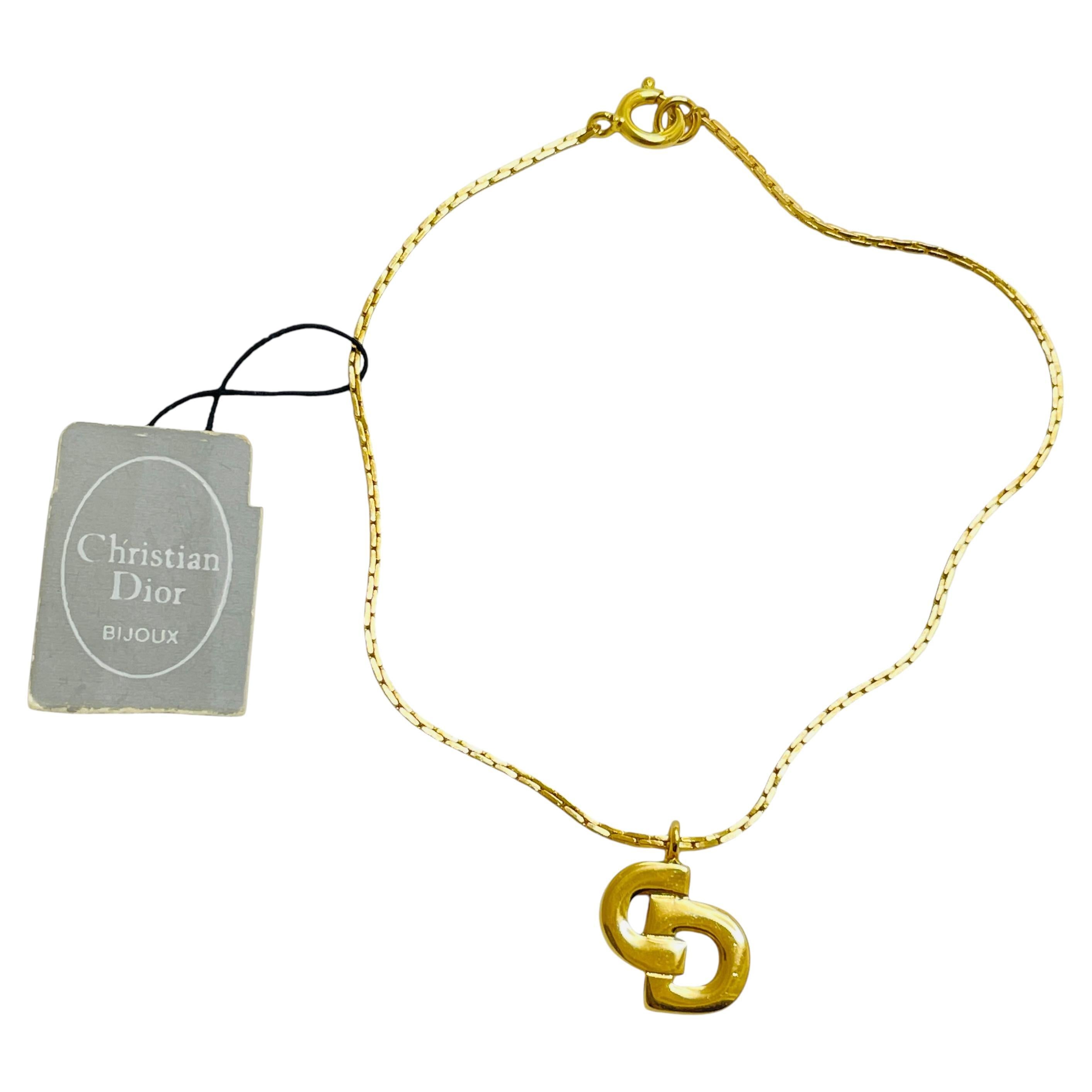 Vintage CHRISTIAN DIOR logo gold plated designer runway bracelet with tag For Sale