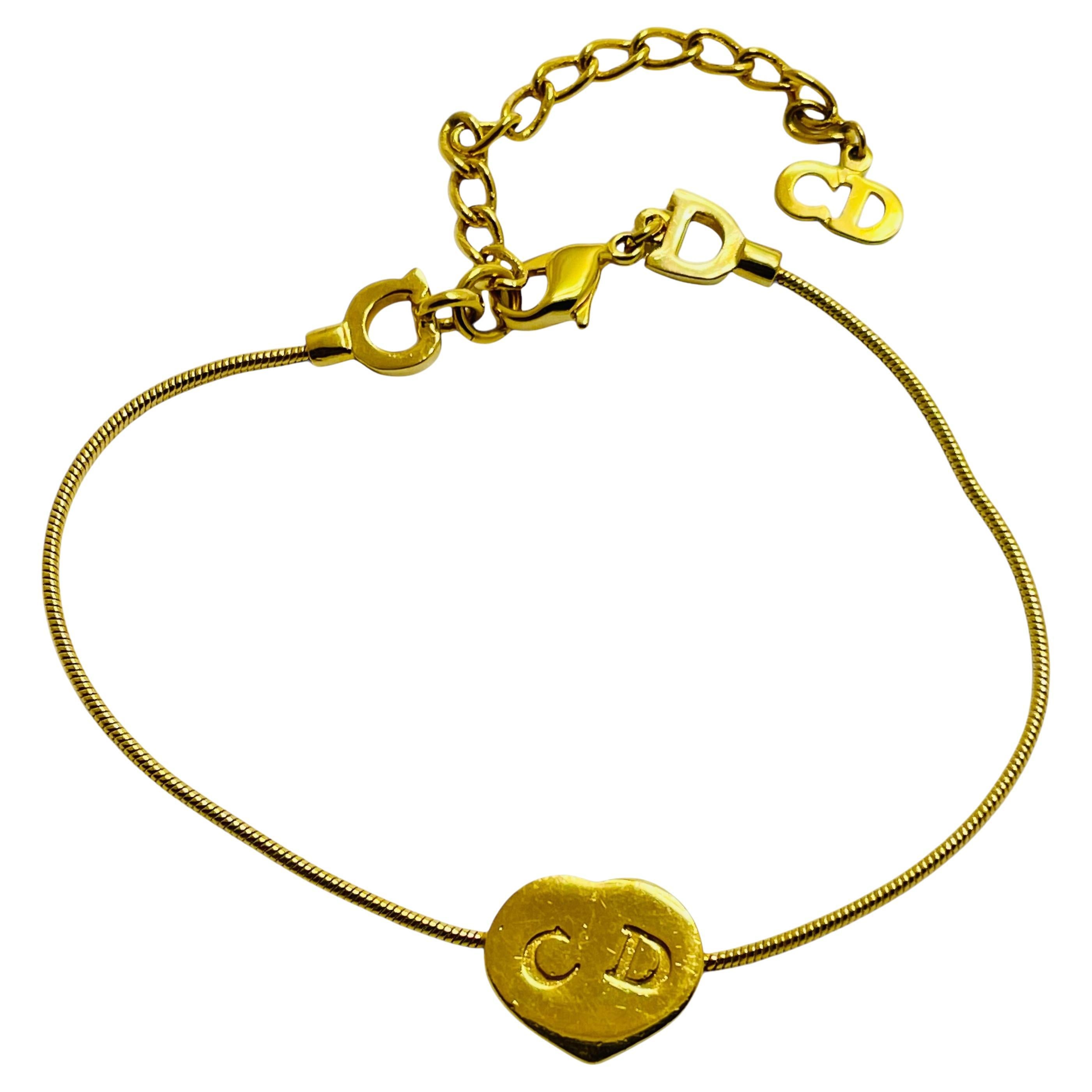 Vintage CHRISTIAN DIOR logo gold plated heart CD logo designer runway bracelet For Sale