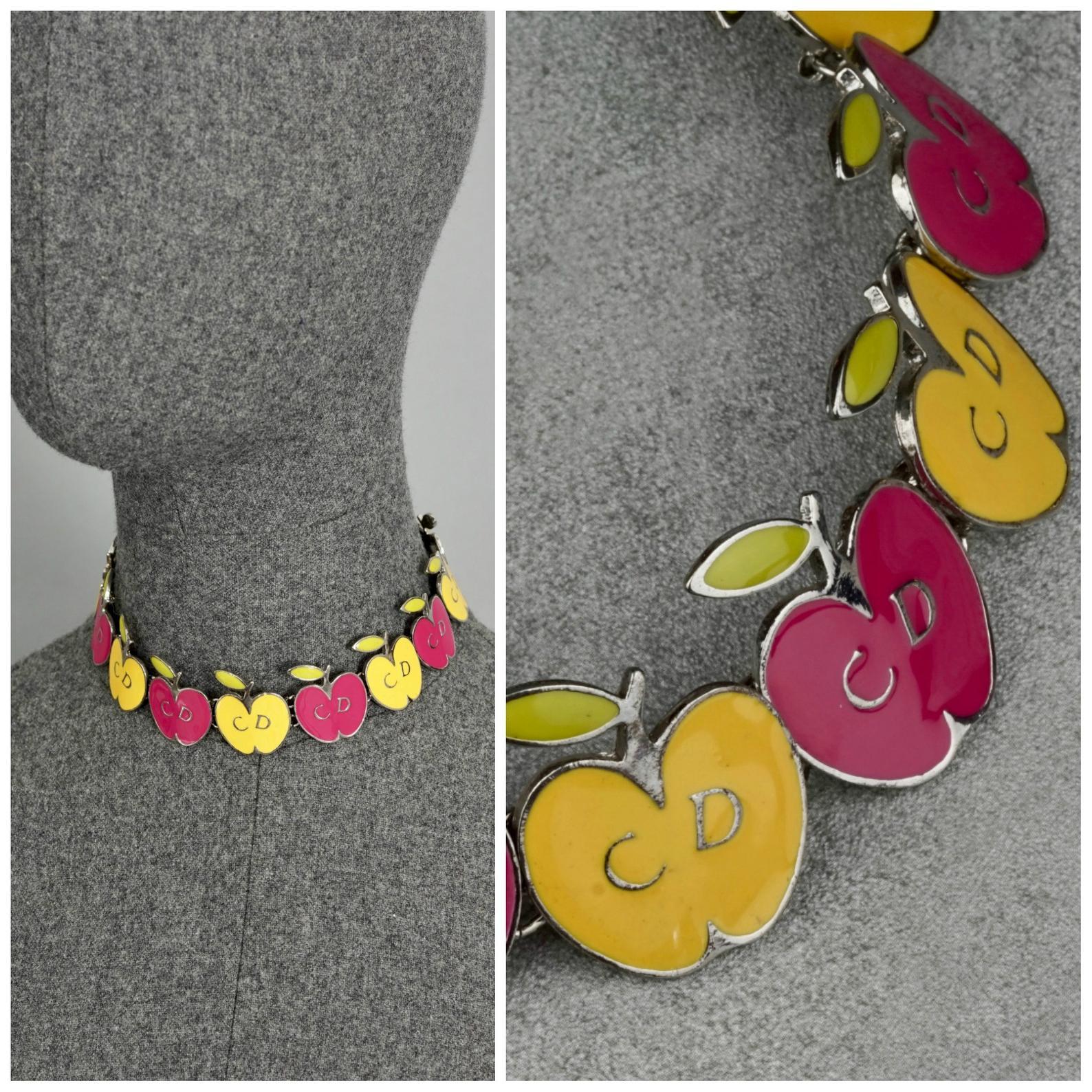 Vintage CHRISTIAN DIOR Logo Pop Enamel Apple Necklace

Measurements:
Height: 1.26 inches (3.2 cm)
Wearable Length: 12.79 inches to 14.56 inches (32.5 cm to 37 cm)

Features:
- 100% Authentic CHRISTIAN DIOR.
- Pop colour enamelled apples in pink,
