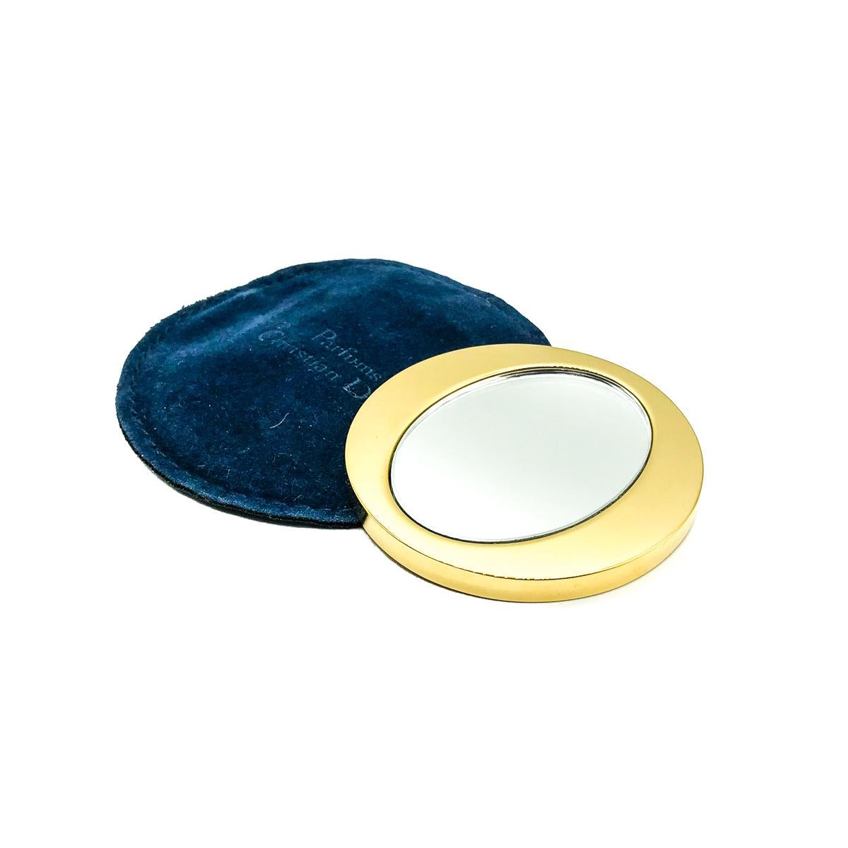 A Vintage Dior Vanity Mirror. Crafted in gold plated metal. In very good vintage condition, signed and approx. 5.8cm. A superb designer accessory from the timeless house of Dior to pop in your fave designer bag.

Established in 2016, this is a