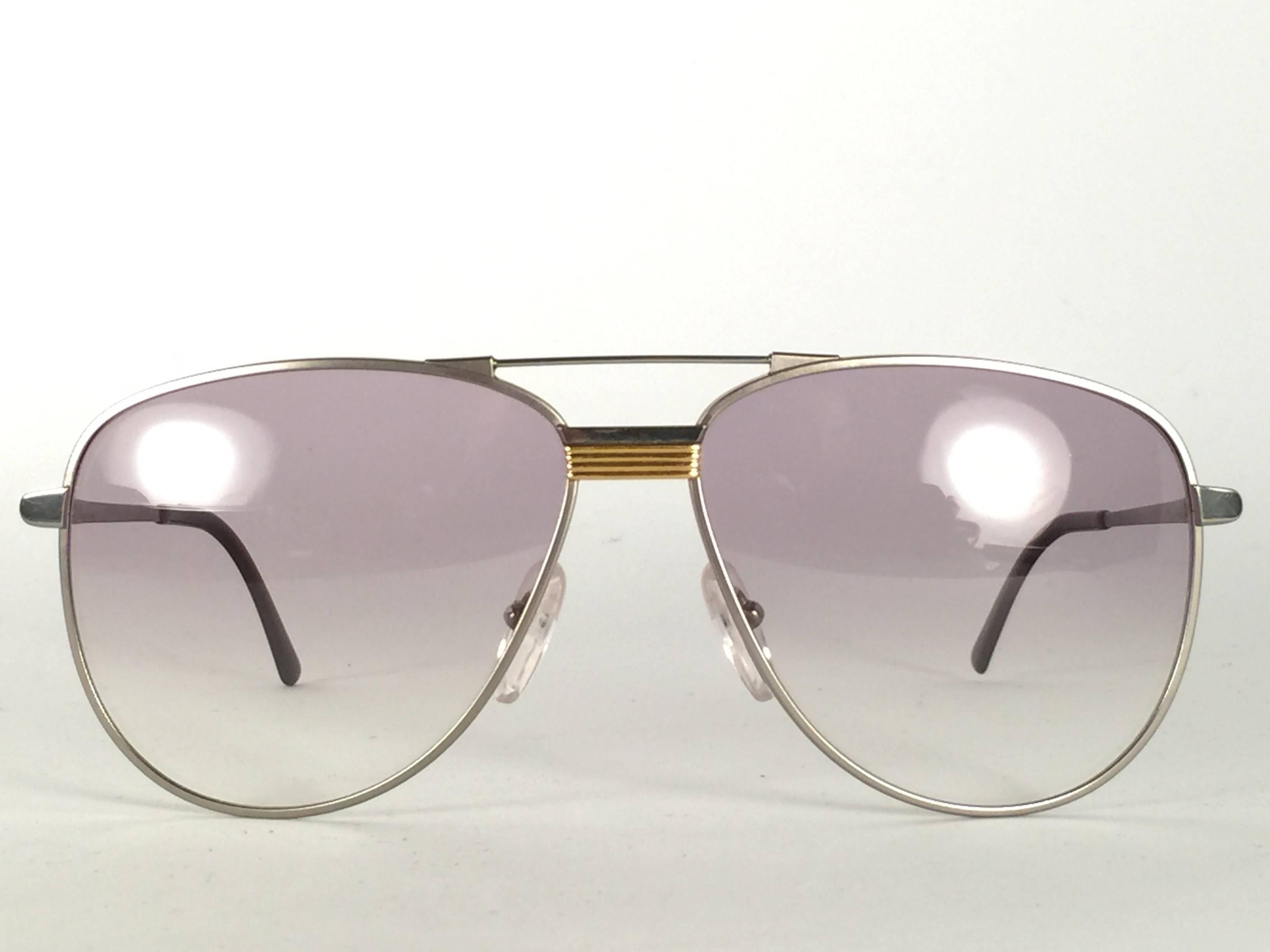 Vintage Christian Dior Monsieur Titanium.

Designed and produced in the 1980’s.  

Made by Optyl. Manufactured in Germany.   

This pair is in mint vintage condition with light wear on the  frame.


