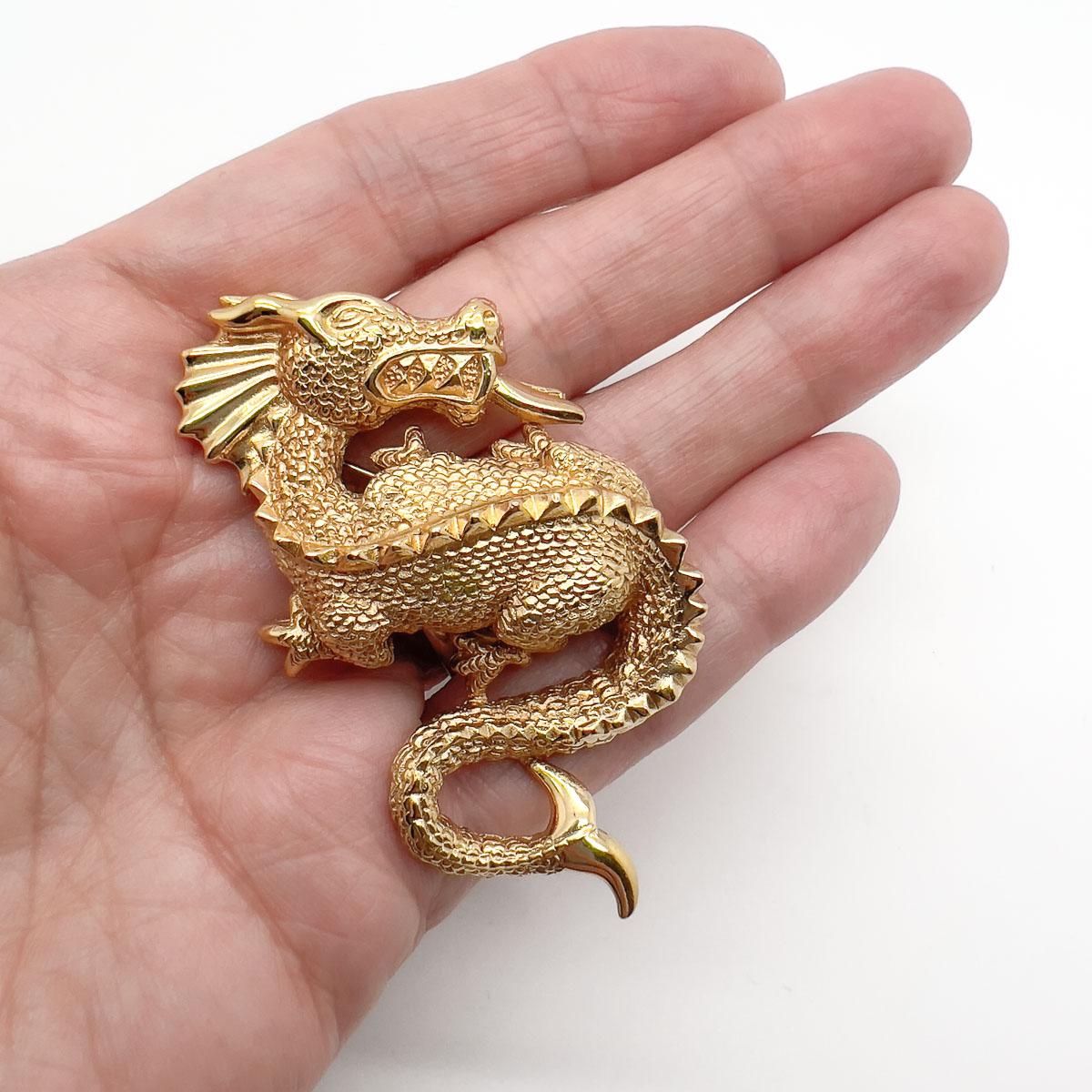 A wonderfully magical Vintage Christian Dior Dragon Brooch that is sure to be a conversation piece as well as an adorable piece of wearable art. Mythological designs have occupied the minds of Dior designers since the early days of the 1950s and so