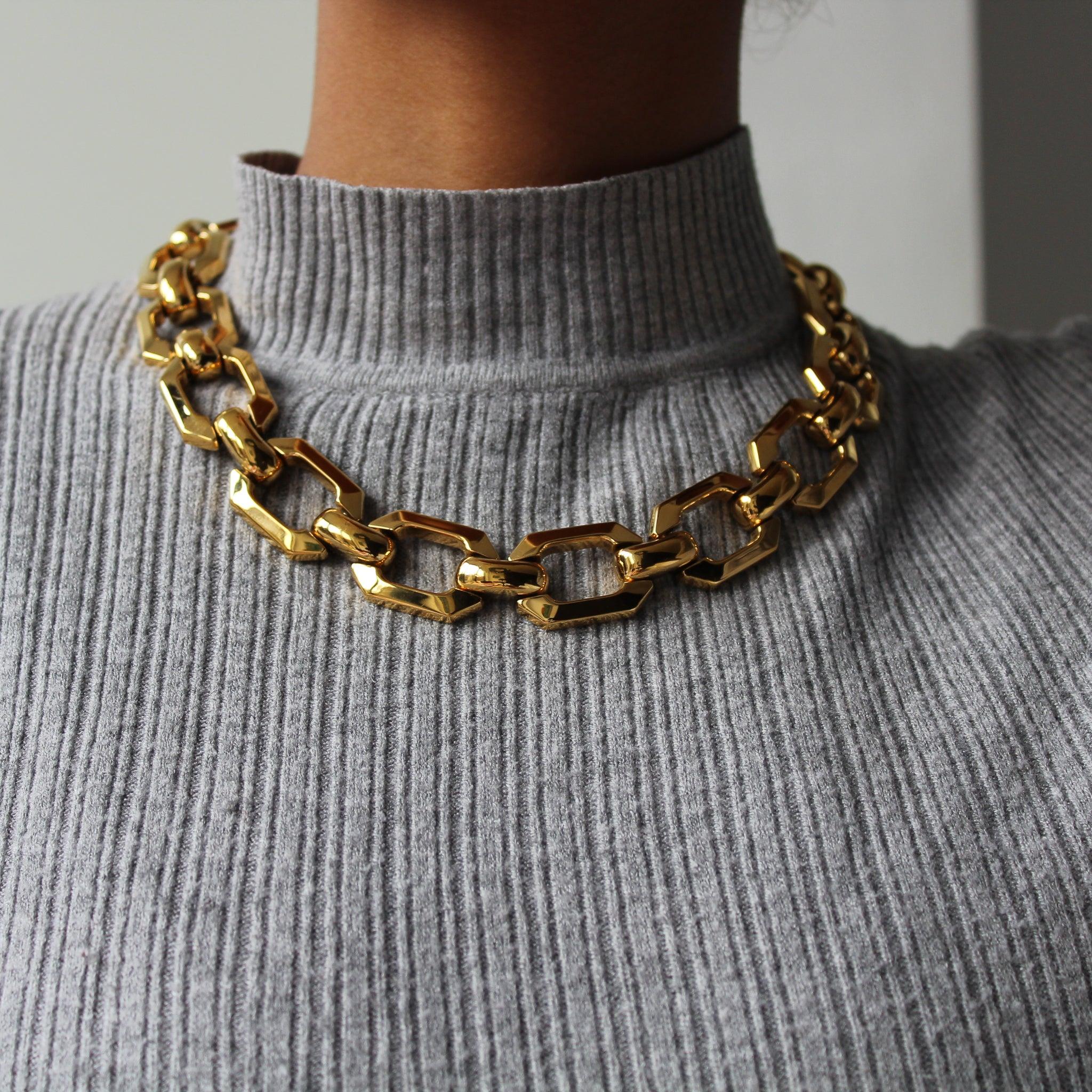 Christian Dior Vintage 1980s Necklace

Super cool chunky collar link necklace from the one of the world's most desirable designers. Crafted in Germany in the early 80s, this incredible necklace is cast from high quality gold plated metal hexagon