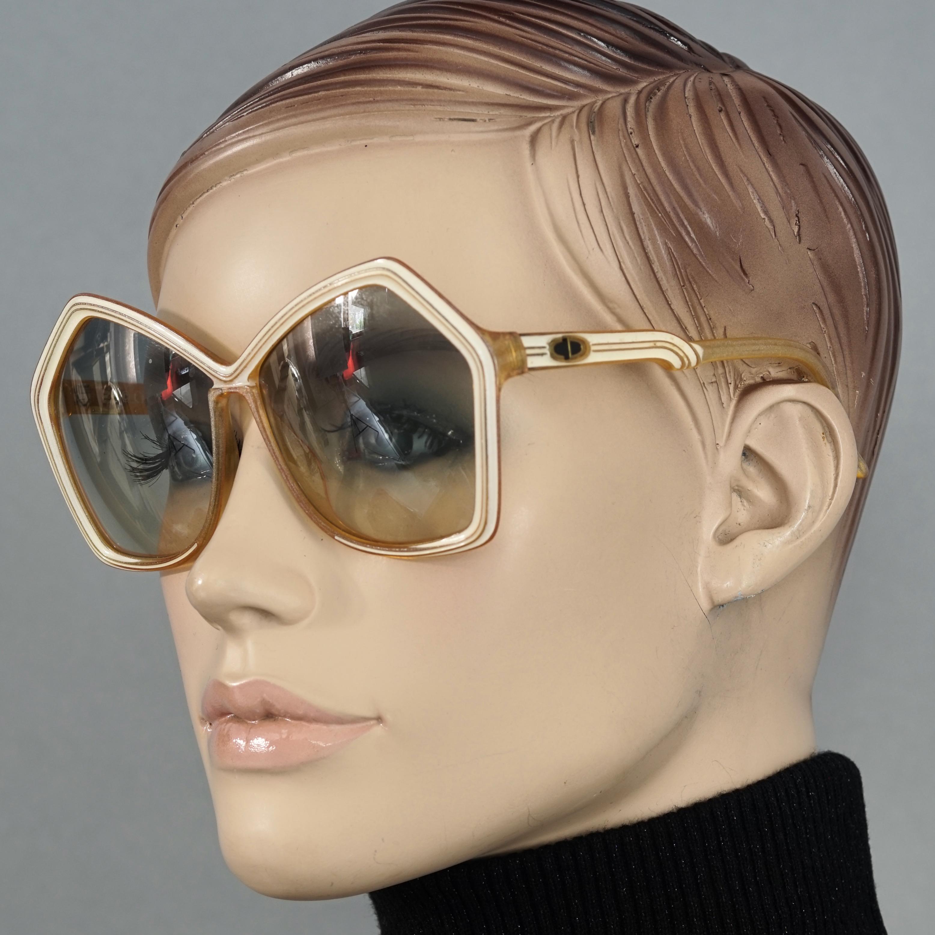 Vintage CHRISTIAN DIOR Pentagon Yellow Sunglasses

Measurements:
Height: 2.55 inches (6.5 cm)
Horizontal Width: 5.59 inches (14.2 cm)
Temples: 4.72 inches (12 cm)

Features:
- 100% Authentic Vintage CHRISTIAN DIOR. 
- Yellow pentagon sunglasses with