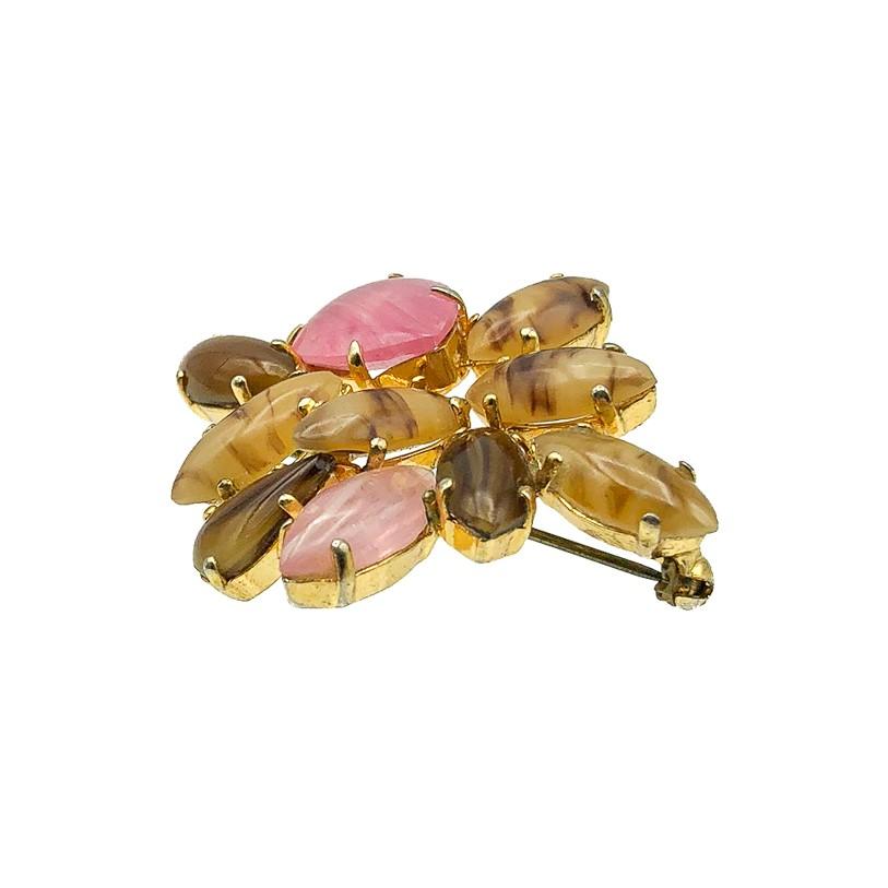 A Vintage Dior Glass Brooch created by Dior in 1962. Crafted in gold plated metal with claw set pink and brown art glass stones in a variety of fancy shapes. In very good vintage condition. Approx. 4.5cms. Signed and dated 1962. A beautiful piece of