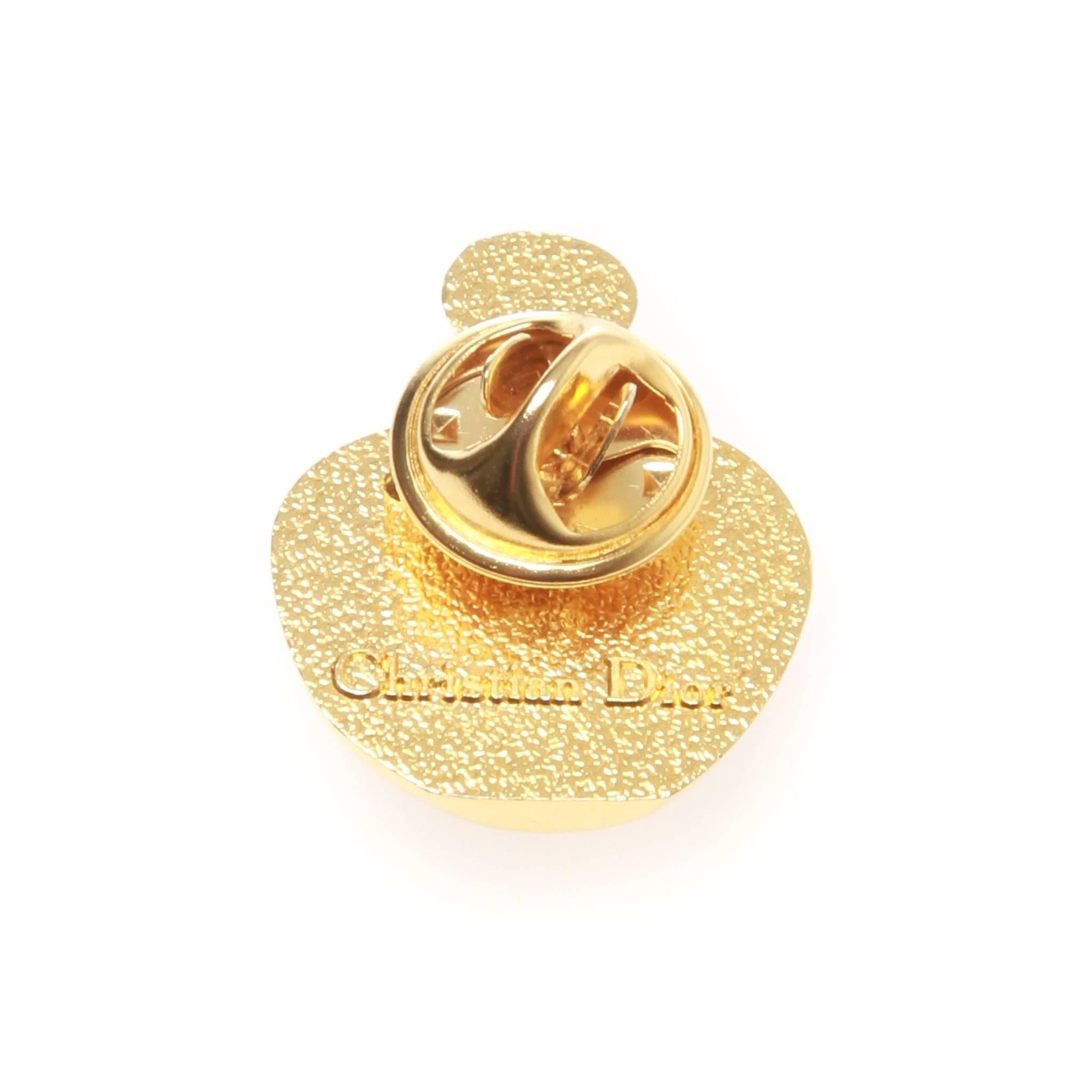 A fabulous vintage gold-tone poison bottle brooch made in the 80's by CHRISTIAN DIOR.

